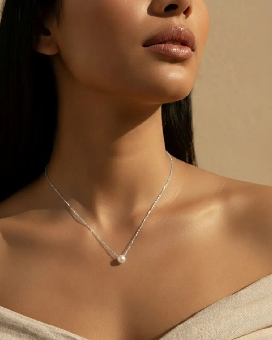 versatile-daily-wear-silver-pearl-necklace, effortless-elegance-jewelry-style, minimalist-accessories-for-office-wear, classy-925-silver-pearl-lifestyle, high-shine-marni-collection-necklace, senya-jewelry-pearl-detail