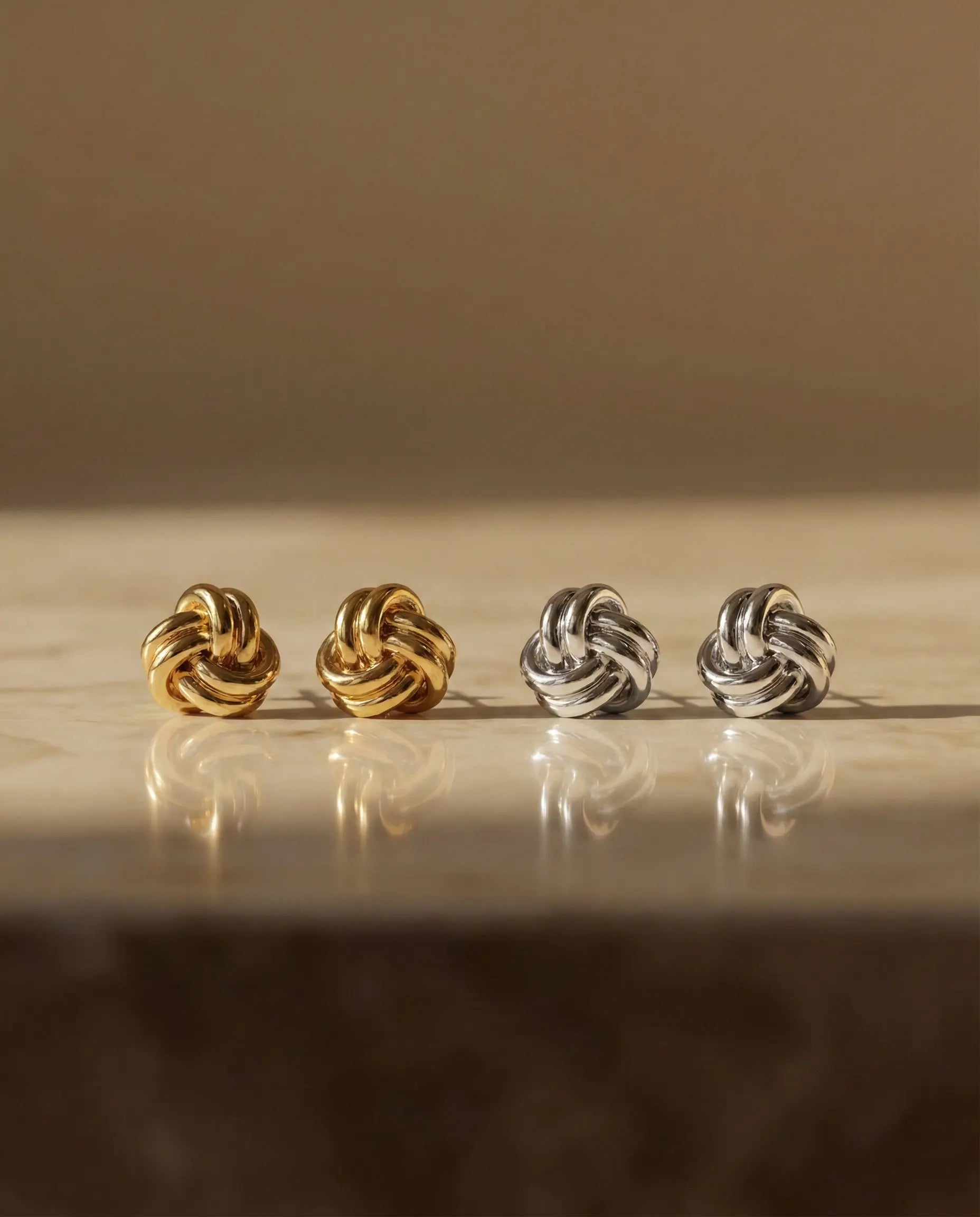 925-sterling-silver-knot-stud-earrings-gold-plated, minimalist-stacking-studs-set, high-quality-silver-jewelry-europe, waterproof-silver-studs-tarnish-resistant, everyday-luxury-knot-design, senya-jewelry-best-seller-earrings