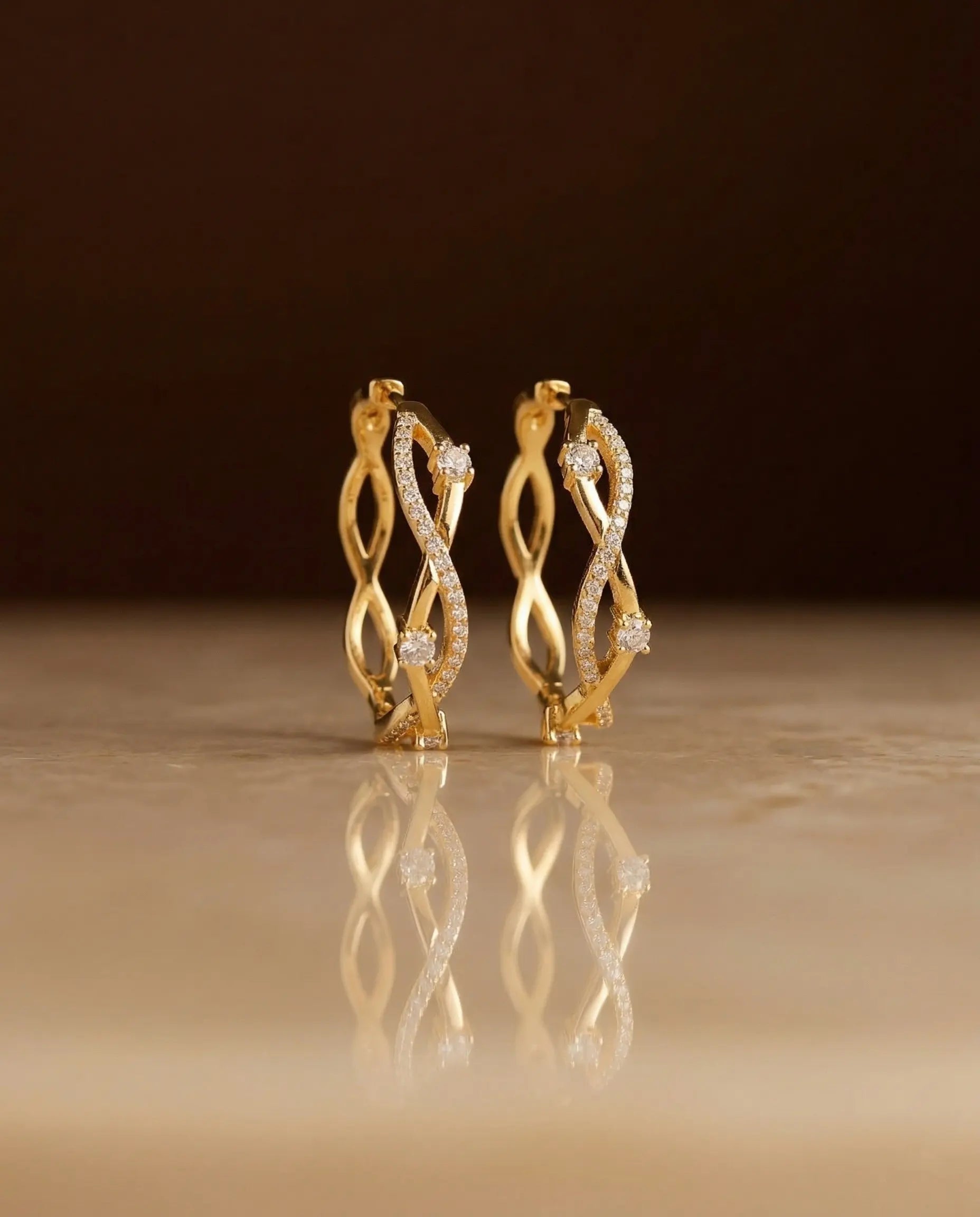 anti-tarnish-925-silver-maddie-earrings-detail, radiant-polished-twisted-shimmer-jewelry, jewelry-for-sensitive-ears-sterling-silver, upscale-jewelry-brand-denmark, modern-classic-pave-infinity-design