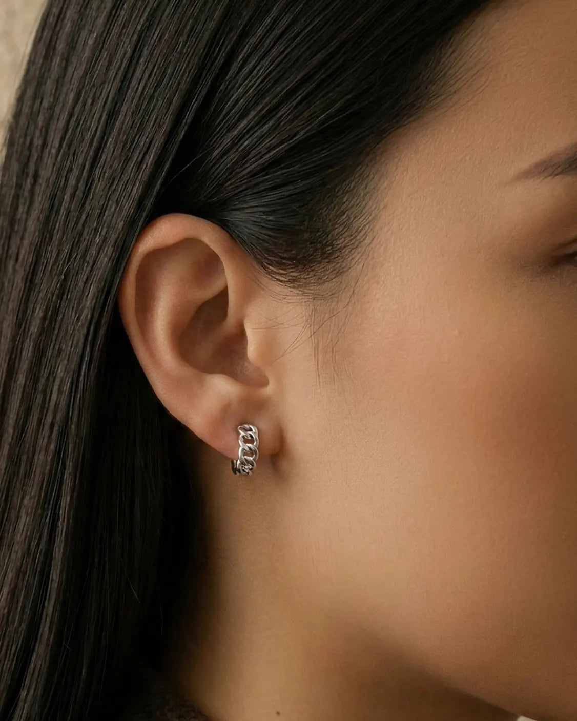 detailed-texture-gold-earrings-close-up, hypoallergenic-gold-plated-hoops, effortless-style-jewelry-model, scandinavian-minimalism-earrings, refined-gold-accessories-for-women, office-wear-jewelry-minimalist, high-end-fashion-earrings-gold