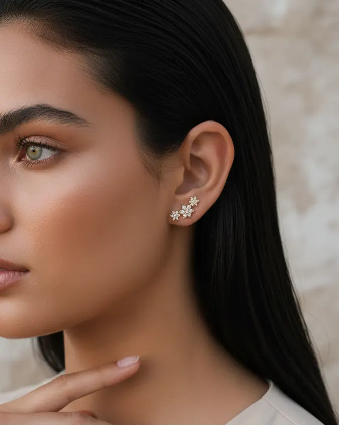 hypoallergenic-flower-earrings-for-sensitive-ears, daily-wear-minimalist-studs, small-sparkle-flower-earrings, effortless-elegance-jewelry-style, high-shine-silver-studs-gold-finish, senya-jewelry-letta-collection