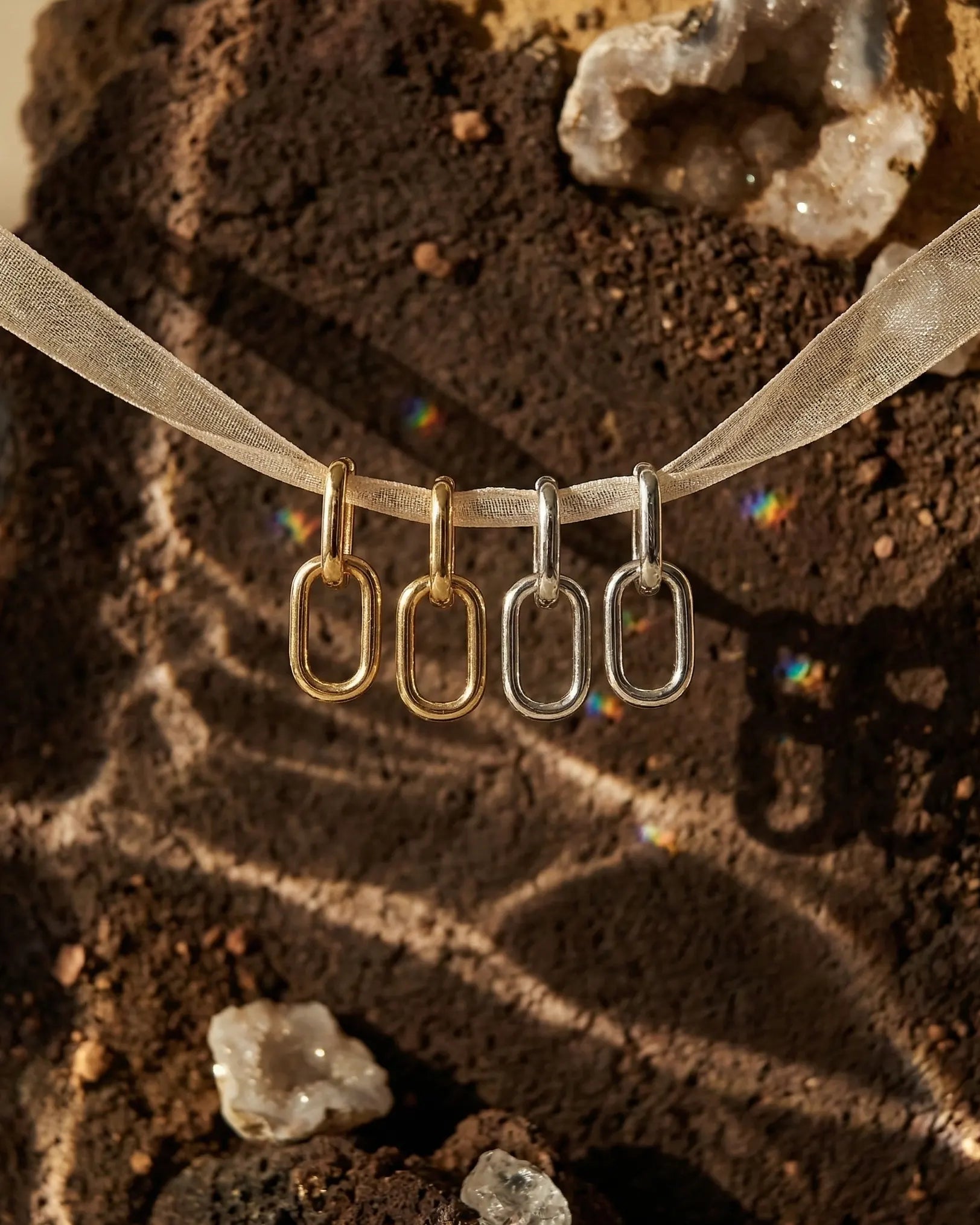 kochi-interlink-drop-earrings-gold-silver-925-luxury, elegant-double-link-hoop-design-aesthetic, high-quality-gold-plated-jewelry-photography, senya-jewelry-best-seller-kochi