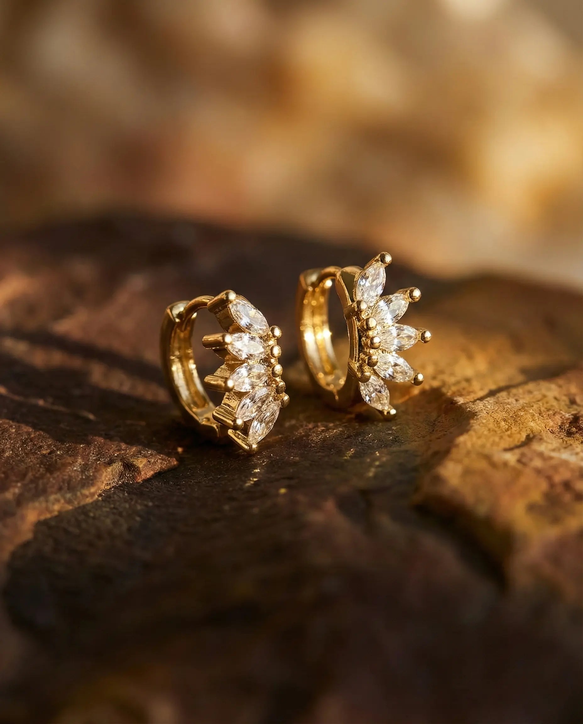 laynie-marquise-star-huggie-earrings-gold-925-sterling, elegant-starburst-design-luxury-aesthetic, high-quality-gold-plated-celestial-jewelry, senya-jewelry-best-seller-laynie-collection