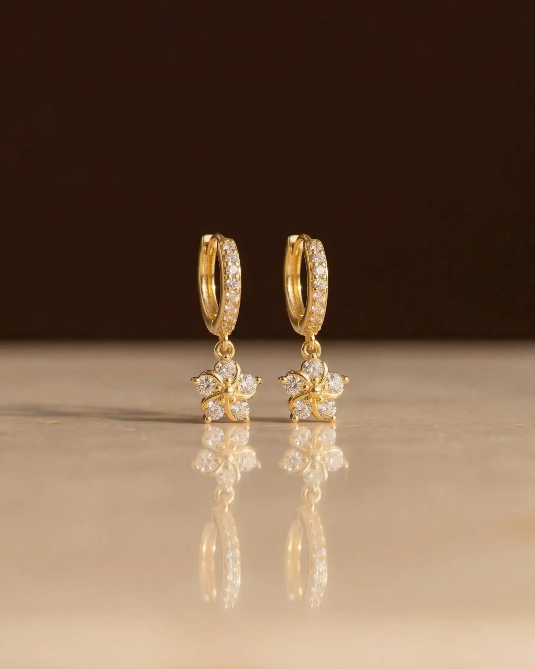 marie-flower-crystal-drop-huggie-earrings-925-silver-gold-plating, elegant-minimalist-celestial-jewelry-luxury, high-quality-tarnish-free-shimmering-earrings, senya-jewelry-best-seller-marie