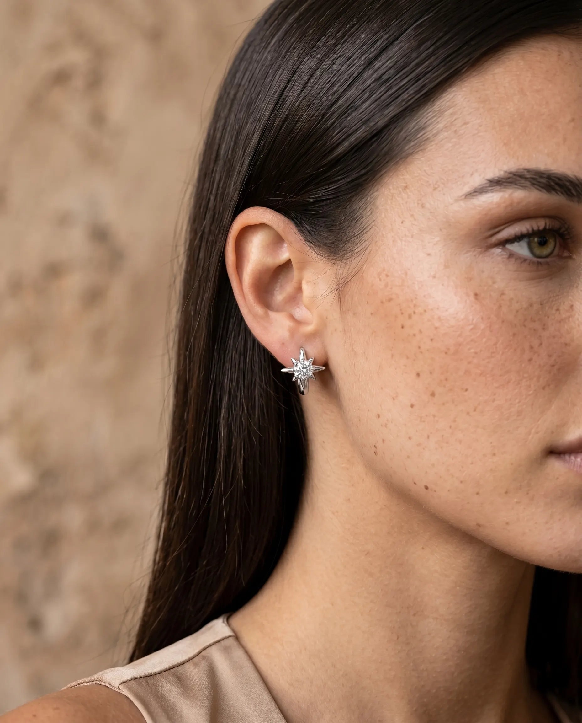 model-profile-wearing-elanor-star-huggie-hoops-minimalist-everyday-luxury-jewelry-style-for-modern-women