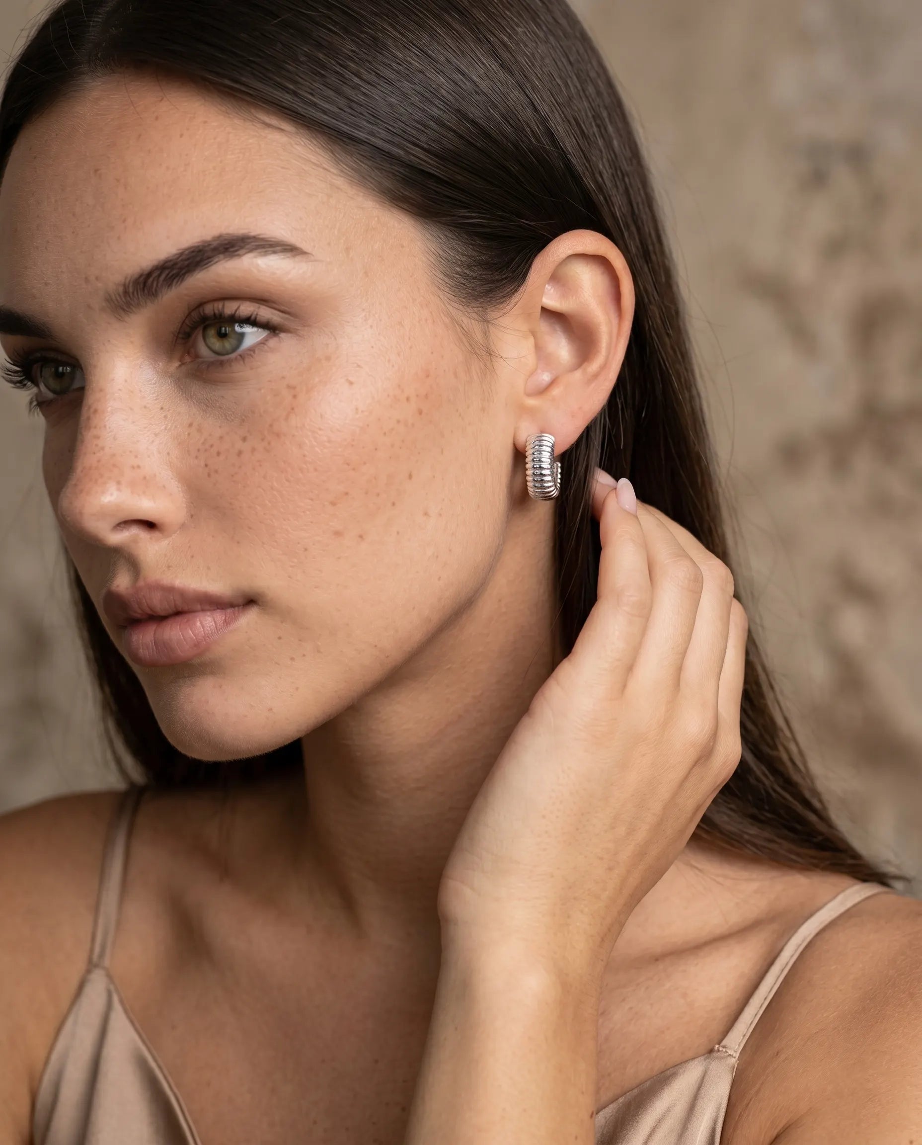 model-profile-wearing-glam-ribbed-hoops-minimalist-everyday-luxury-jewelry-style-for-modern-women