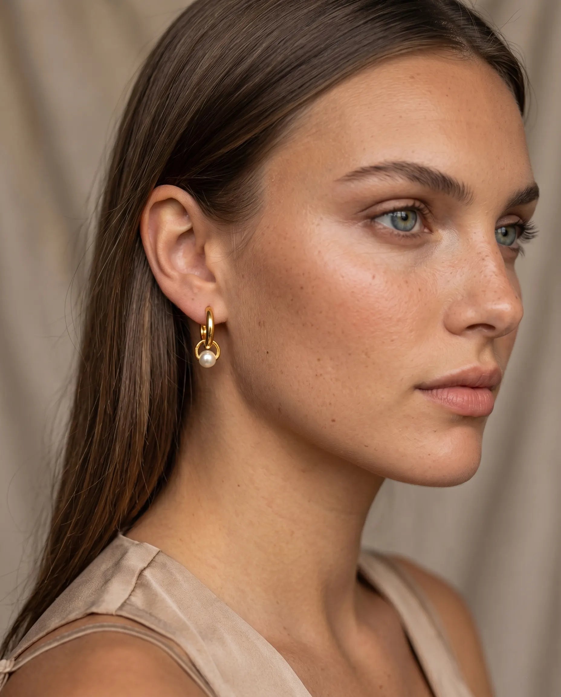 model-profile-wearing-palma-pearl-drop-hoops-minimalist-everyday-luxury-jewelry-style-for-modern-women