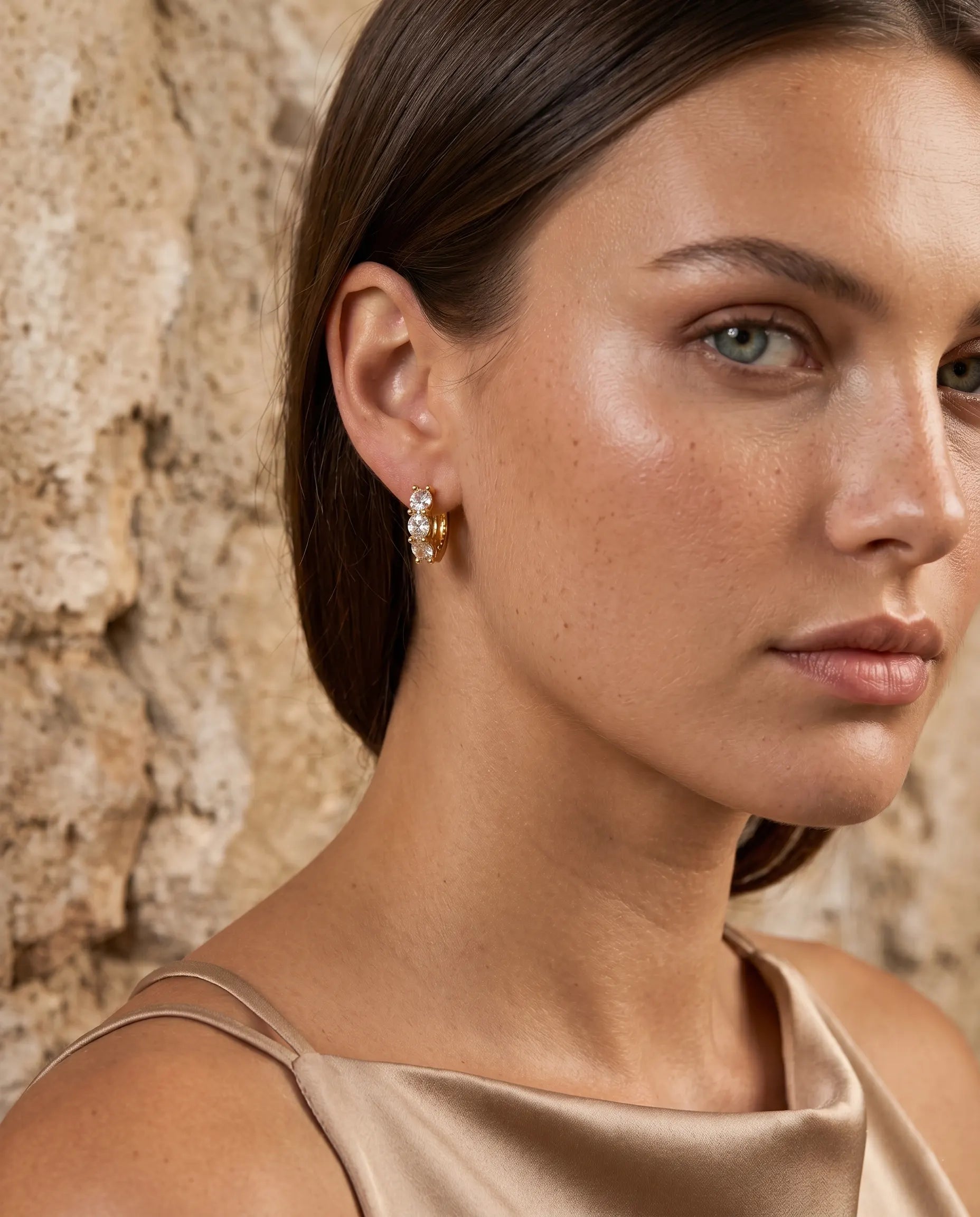 model-wearing-blanca-crystal-huggie-hoops-in-curated-ear-stack-minimalist-everyday-luxury-jewelry-style-for-professional-women-senya-jewelry-collection