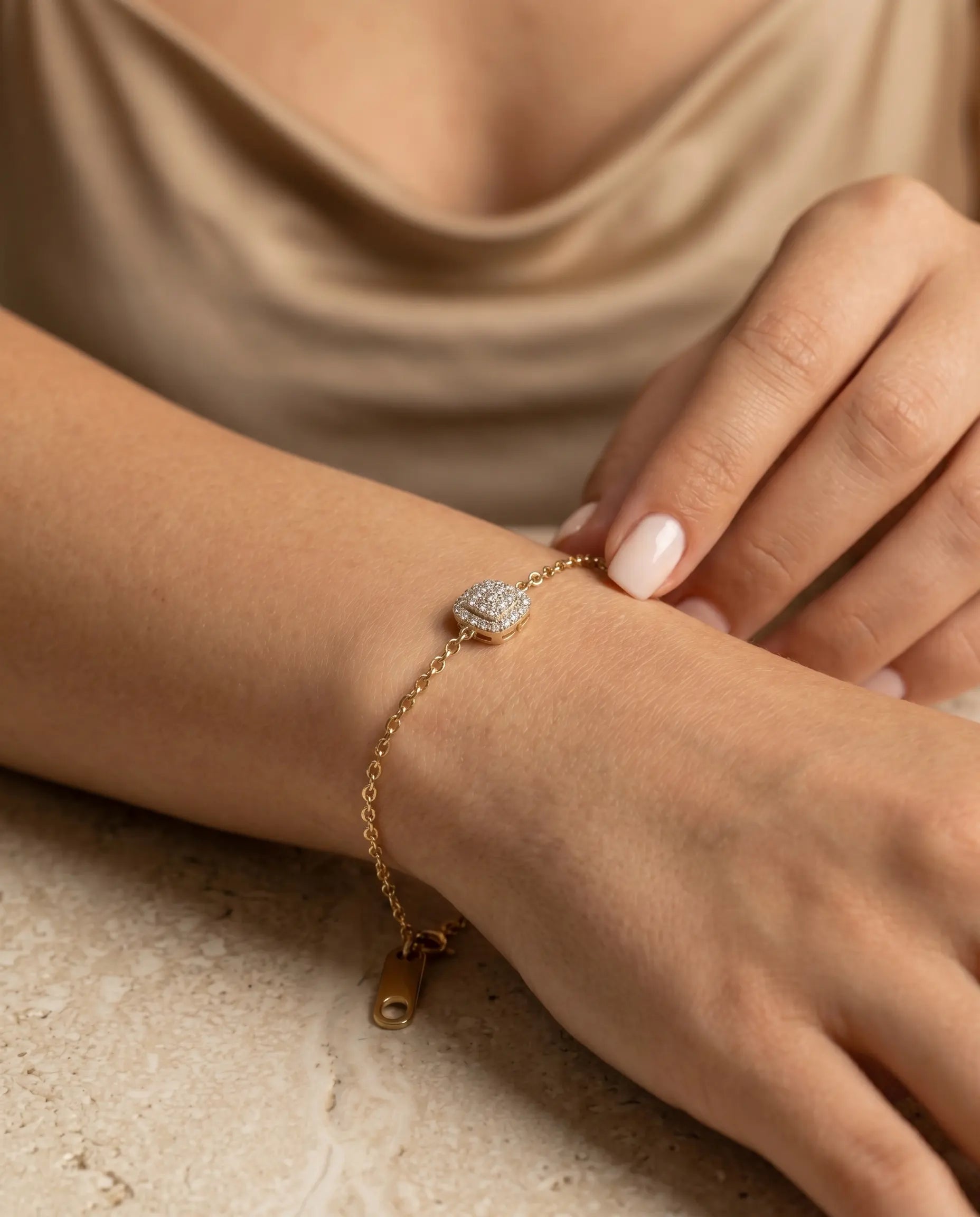 model-wearing-gold-artana-crystal-bracelet-lifestyle, elegant-modern-feminine-jewelry-on-wrist, professional-women-luxury-accessories, chic-gold-chain-bracelet-styling, luxury-lifestyle-brand-model