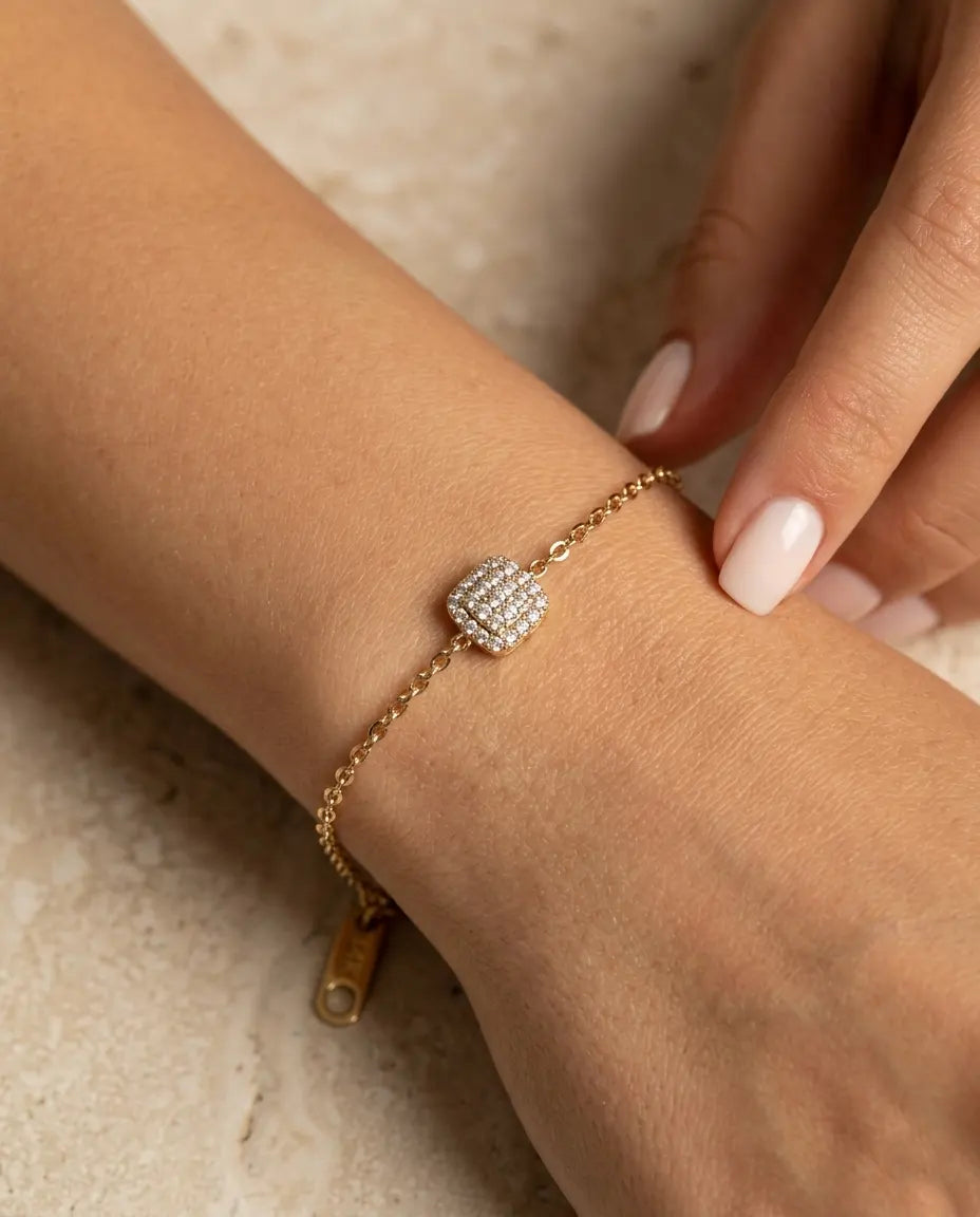 model-wearing-gold-artana-crystal-bracelet-lifestyle, elegant-modern-feminine-jewelry-on-wrist, professional-women-luxury-accessories, chic-gold-chain-bracelet-styling, luxury-lifestyle-brand-model