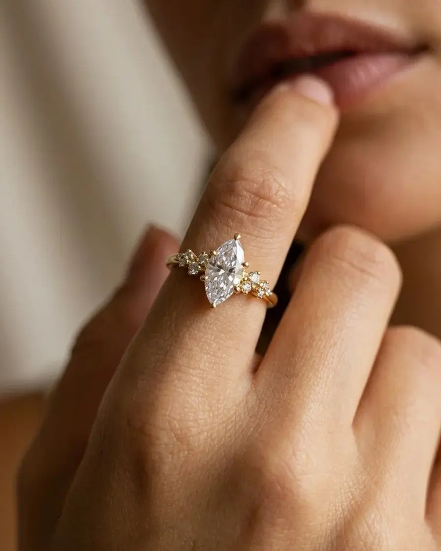 model-wearing-gold-athena-crown-ring-lifestyle, elegant-modern-feminine-jewelry-on-hand, professional-women-luxury-accessories, chic-marquise-gold-styling, luxury-lifestyle-brand-model