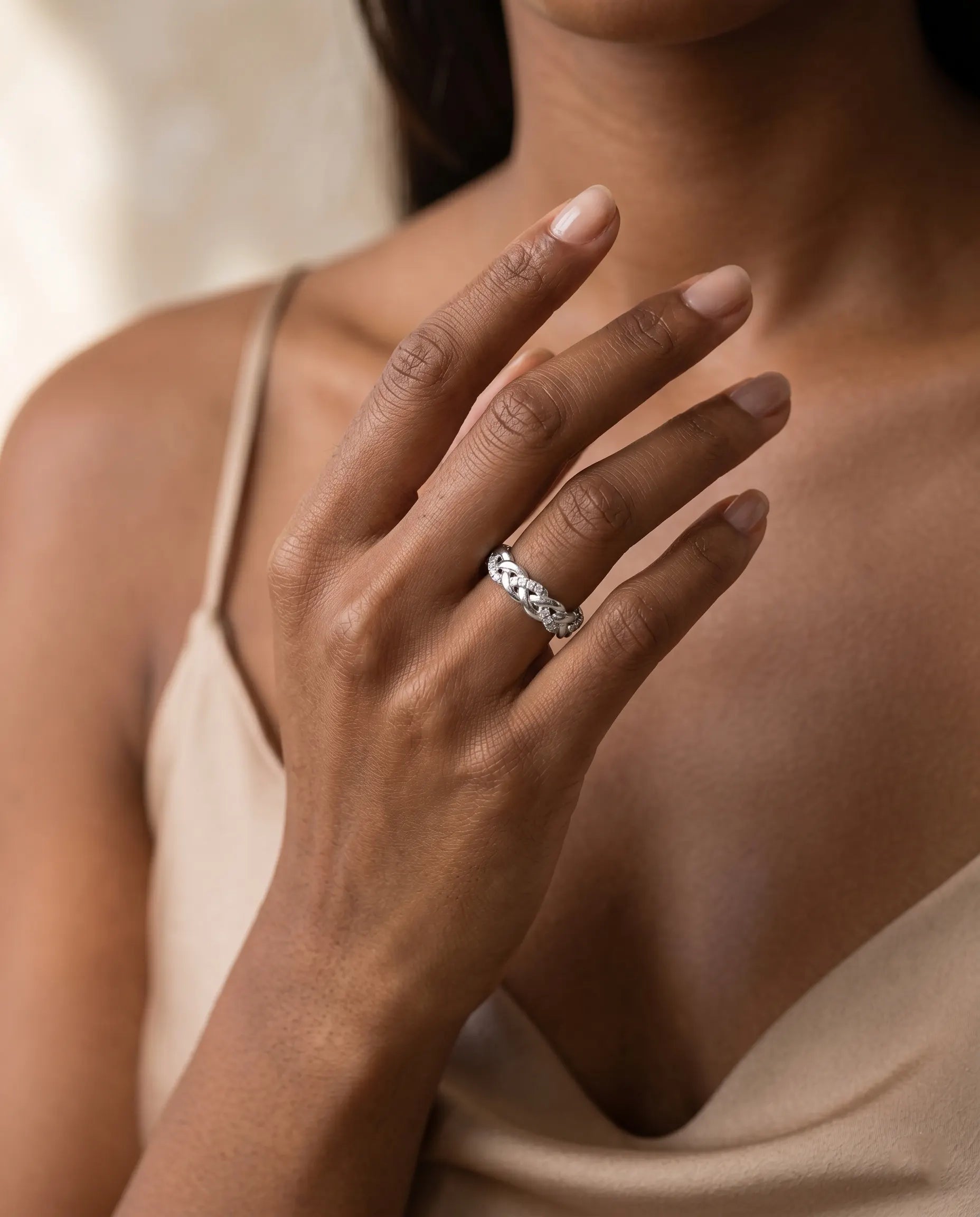 model-wearing-gold-avalon-bold-band-lifestyle, elegant-understated-everyday-luxury-jewelry, professional-women-minimalist-accessories, chic-gold-chunky-ring-photography, luxury-lifestyle-brand-model