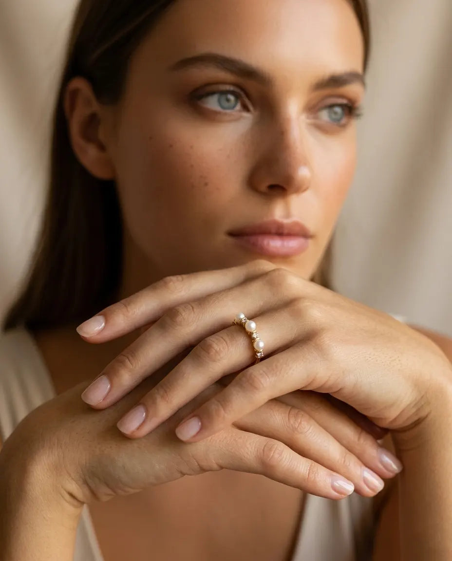 model-wearing-gold-barletta-pearl-ring-lifestyle, elegant-modern-feminine-jewelry-on-hand, professional-women-luxury-accessories, chic-gold-pearl-ring-styling, luxury-lifestyle-brand-model
