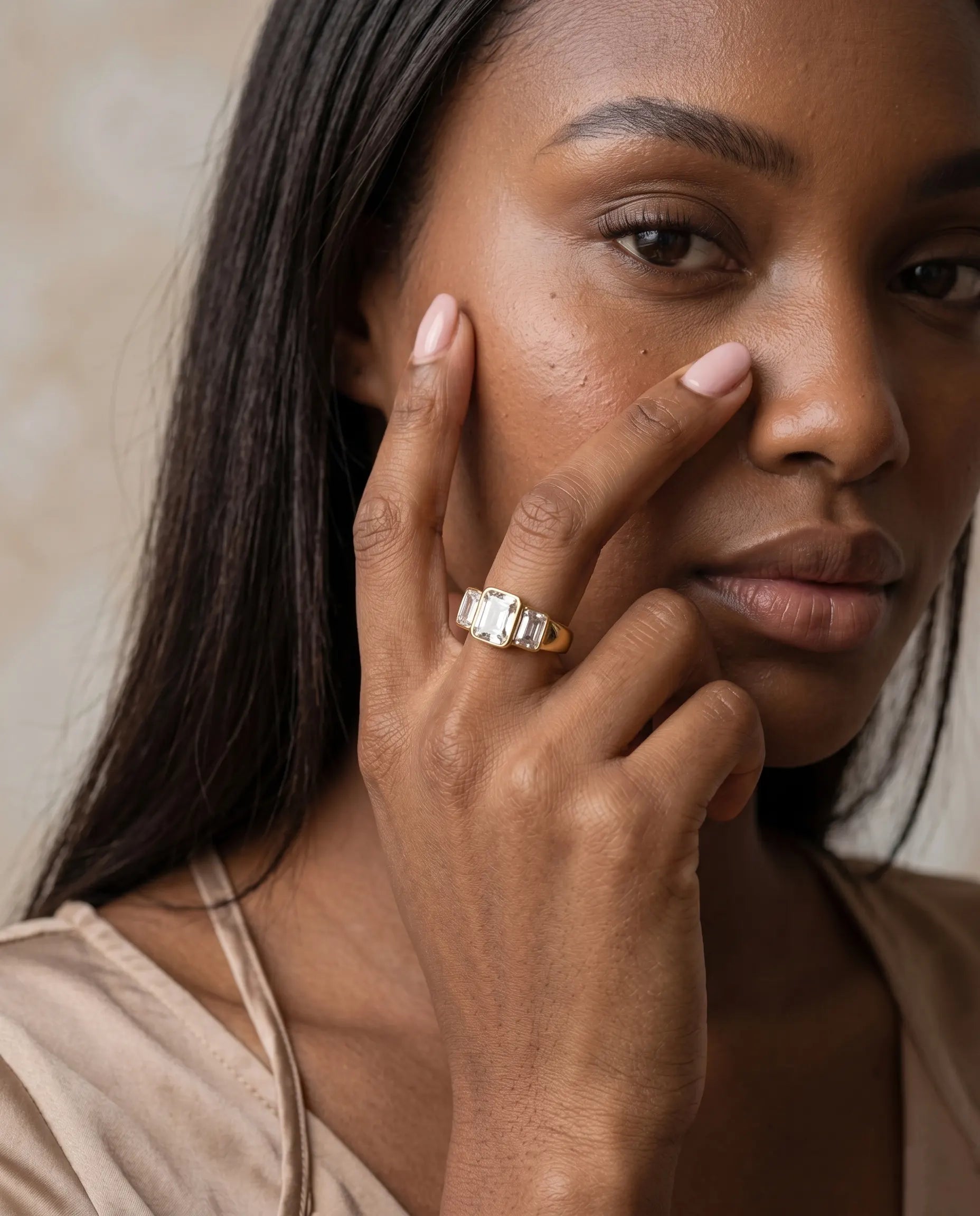 model-wearing-gold-beam-wide-band-ring-lifestyle, elegant-modern-architectural-jewelry-on-hand, professional-women-luxury-accessories, chic-gold-statement-ring-styling, luxury-lifestyle-brand-model