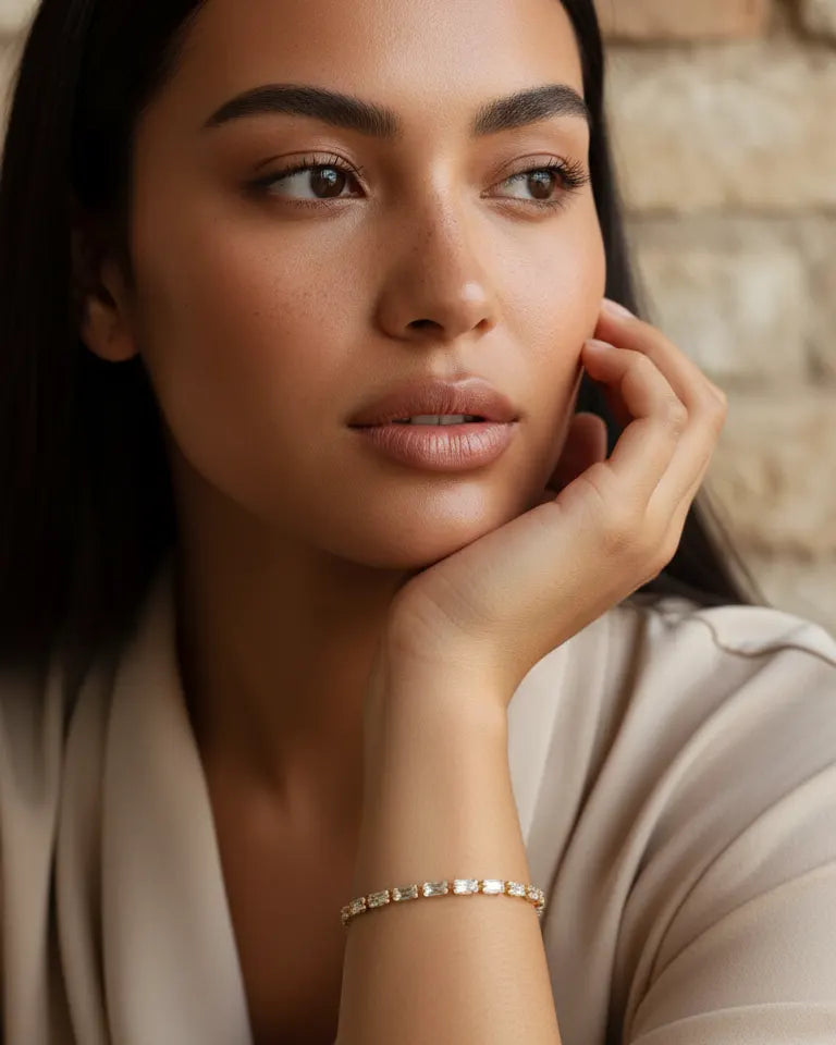 model-wearing-gold-bianca-zirconia-bracelet, elegant-sparkling-jewelry-lifestyle, professional-women-delicate-accessories, chic-minimalist-jewelry-photography, luxury-lifestyle-brand-model