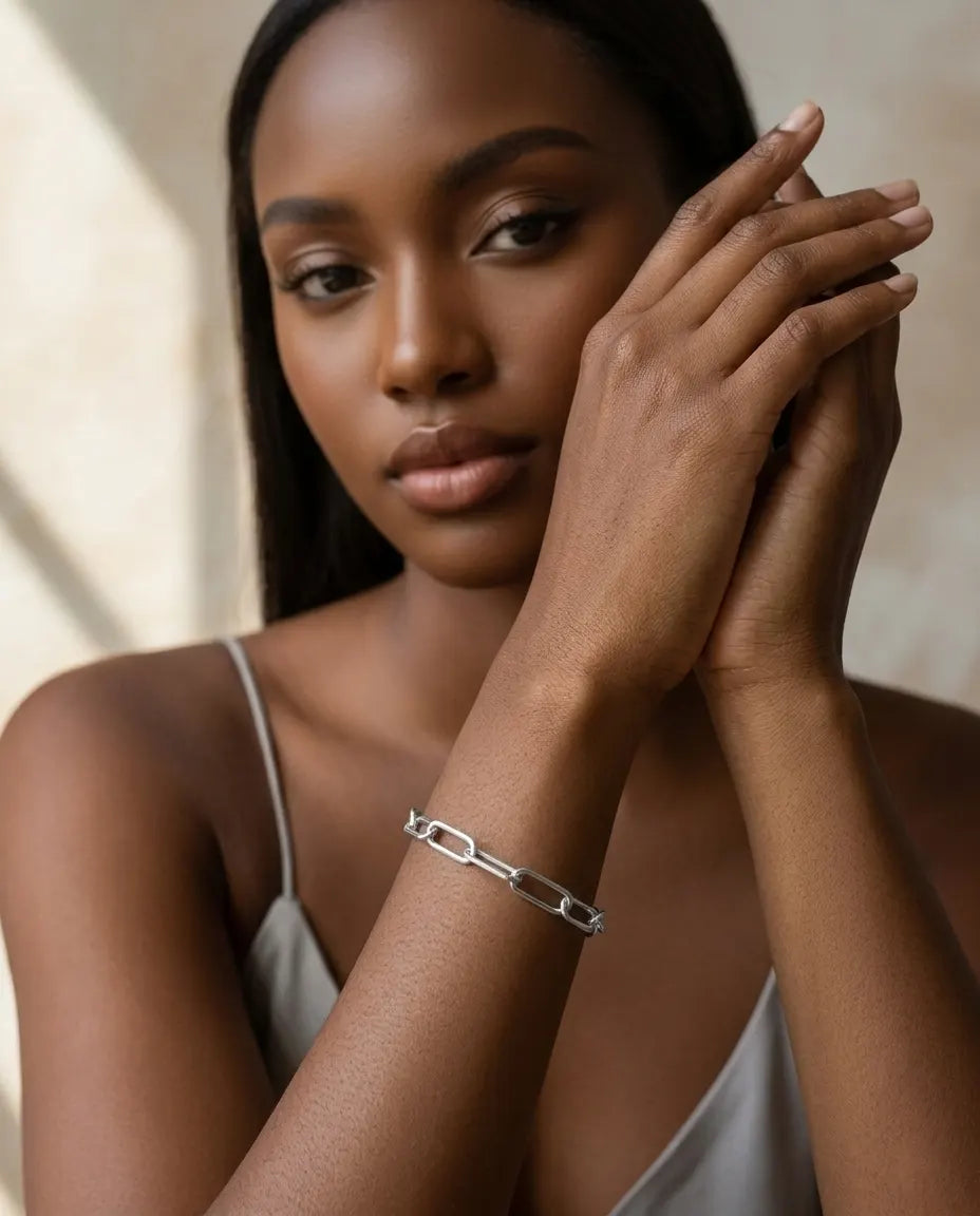 model-wearing-gold-blaire-link-bracelet-lifestyle, elegant-modern-feminine-jewelry-on-wrist, professional-women-luxury-accessories, chic-gold-chain-bracelet-styling, luxury-lifestyle-brand-model