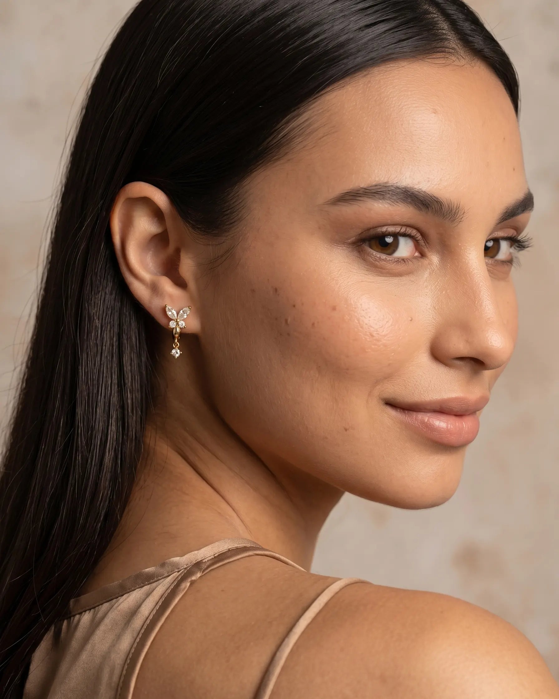 model-wearing-gold-chiara-butterfly-earrings, elegant-feminine-jewelry-lifestyle, professional-women-jewelry-style, chic-minimalist-butterfly-accessories-photography, luxury-lifestyle-brand-model
