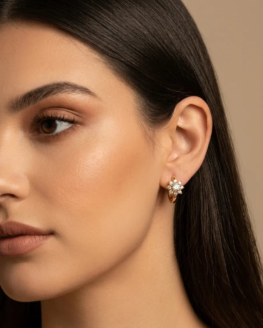 model-wearing-gold-felicia-flower-hoops-lifestyle, elegant-modern-feminine-jewelry-on-ear, professional-women-luxury-accessories, chic-crystal-floral-earrings-styling, luxury-lifestyle-brand-model