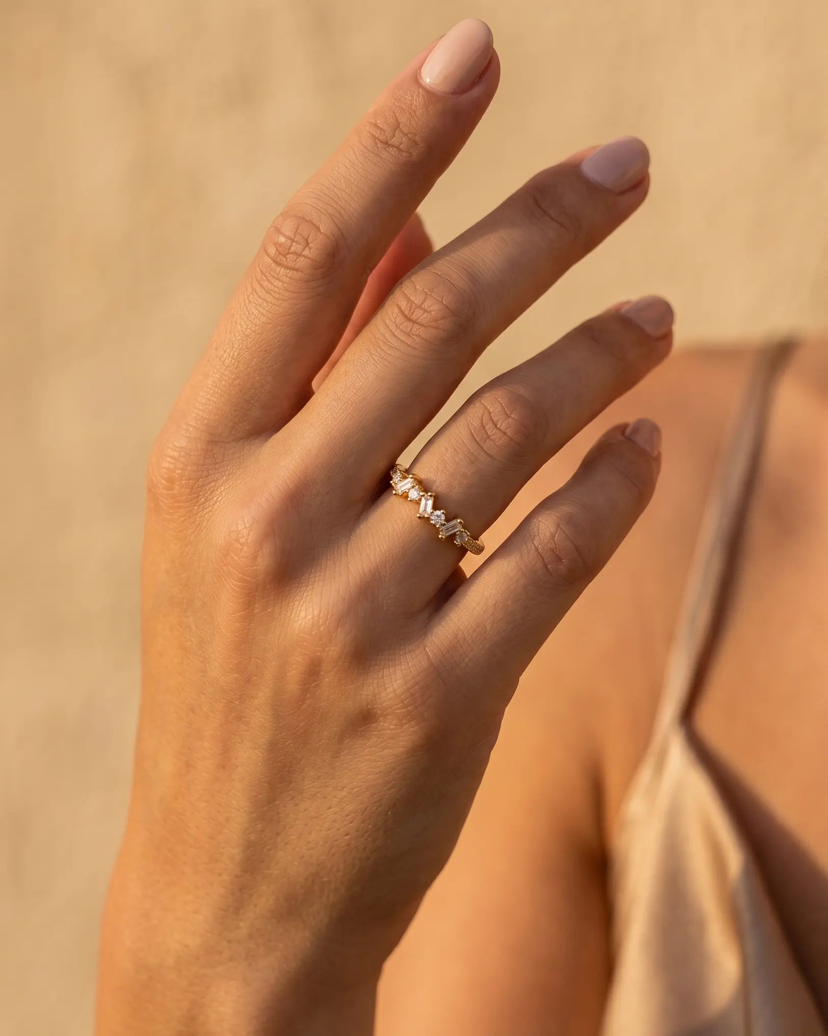 model-wearing-gold-gemma-zirconia-ring, elegant-pure-radiance-jewelry-lifestyle, professional-women-luxury-accessories, chic-minimalist-jewelry-photography, luxury-lifestyle-brand-model