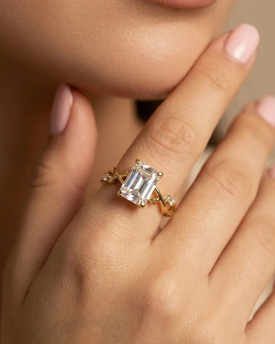 model-wearing-gold-hera-emerald-cut-ring-lifestyle, elegant-modern-sovereign-jewelry-on-hand, professional-women-luxury-accessories, chic-zirconia-statement-ring-styling, luxury-lifestyle-brand-model