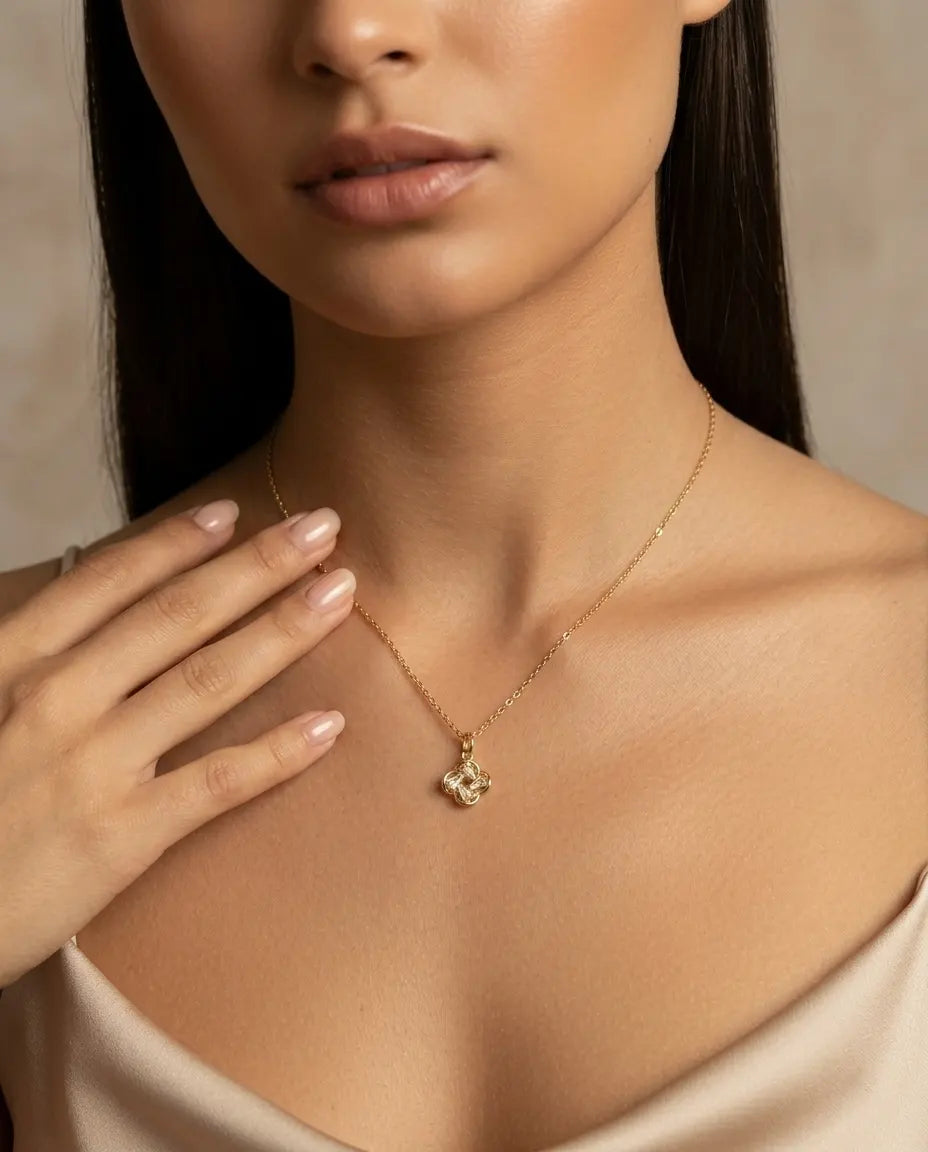 model-wearing-gold-juliet-heart-necklace-lifestyle, elegant-modern-feminine-jewelry-on-neck, professional-women-luxury-accessories, chic-gold-heart-pendant-styling, luxury-lifestyle-brand-model