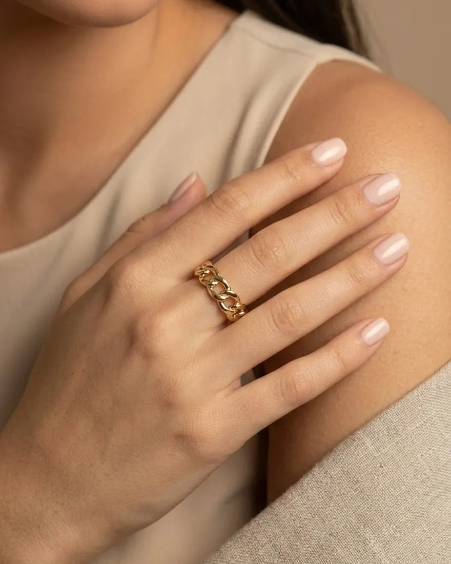 model-wearing-gold-kiana-chain-ring-lifestyle, elegant-modern-understated-jewelry-on-hand, professional-women-luxury-accessories, chic-925-silver-chain-ring-styling, luxury-lifestyle-brand-model