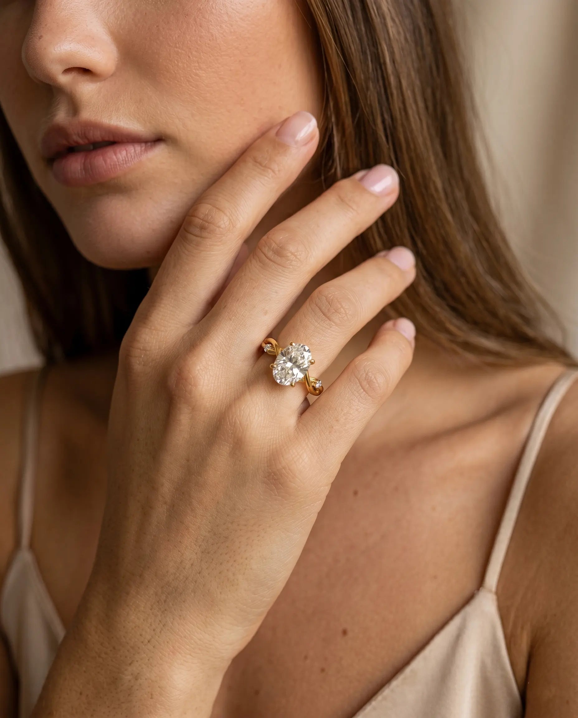 model-wearing-gold-magma-braided-rope-ring-lifestyle, elegant-modern-feminine-jewelry-on-hand, professional-women-luxury-accessories, chic-chunky-gold-styling, luxury-lifestyle-brand-model
