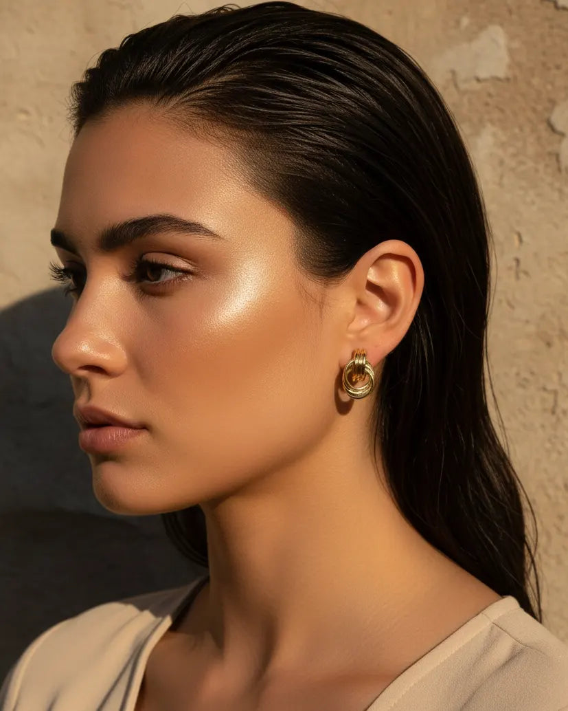 model-wearing-gold-monaco-double-hoops, elegant-statement-jewelry-lifestyle, professional-women-jewelry-style, chic-minimalist-accessories-for-active-wear, luxury-lifestyle-brand-photography, premium-jewelry-model-shot