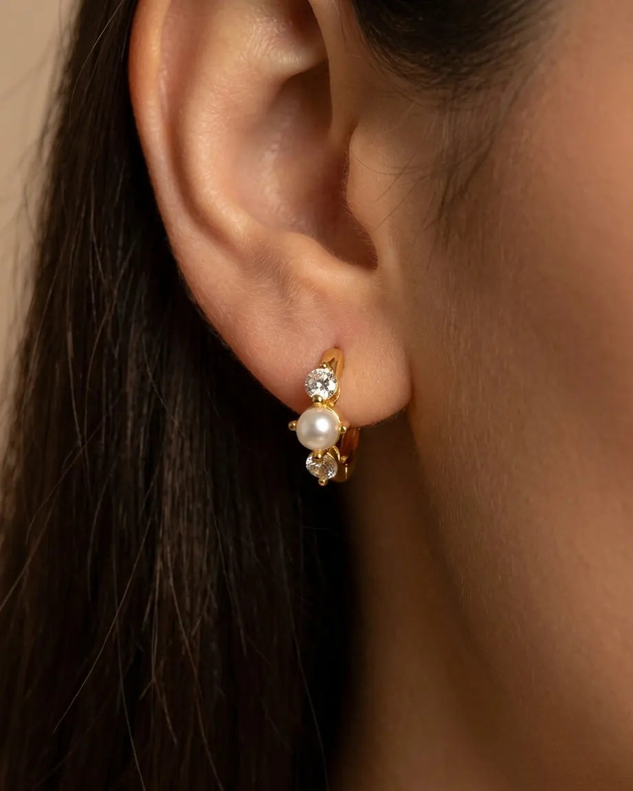 model-wearing-gold-nana-pearl-zirconia-hoops, elegant-timeless-pearl-jewelry-lifestyle, professional-women-wedding-style, chic-minimalist-accessories-photography, luxury-lifestyle-brand-model