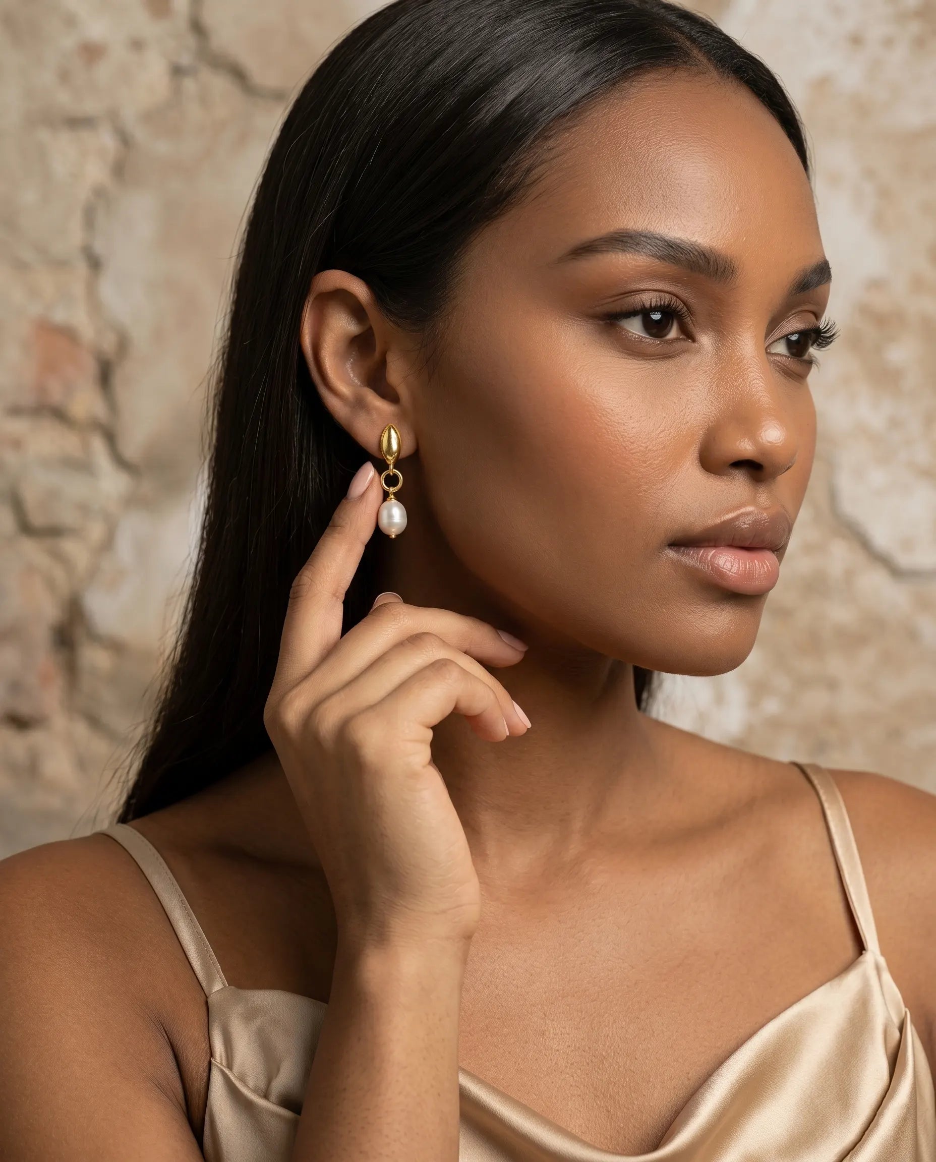 model-wearing-gold-petal-pearl-drop-earrings-lifestyle, elegant-modern-feminine-jewelry-on-ear, professional-women-luxury-accessories, chic-botanical-gold-styling, luxury-lifestyle-brand-model