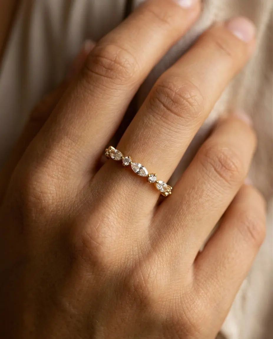 model-wearing-gold-prism-stacking-ring-lifestyle, elegant-modern-feminine-jewelry-on-hand, professional-women-luxury-accessories, chic-marquise-gold-styling, luxury-lifestyle-brand-model