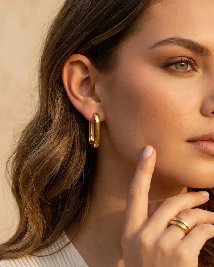model-wearing-gold-seville-square-hoops-lifestyle, elegant-understated-everyday-luxury-jewelry, professional-women-minimalist-accessories, chic-geometric-gold-hoop-photography, luxury-lifestyle-brand-model