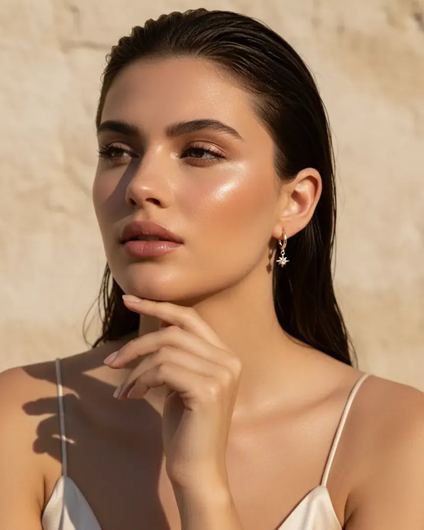 model-wearing-gold-stardust-star-earrings, elegant-celestial-jewelry-lifestyle, professional-women-jewelry-style, chic-modern-star-hoops-photography, luxury-lifestyle-brand-model, premium-celestial-accessories