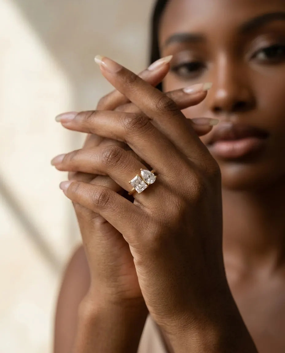 model-wearing-gold-sunday-double-stone-ring-lifestyle, elegant-modern-feminine-jewelry-on-hand, professional-women-luxury-accessories, chic-gold-bypass-ring-styling, luxury-lifestyle-brand-model