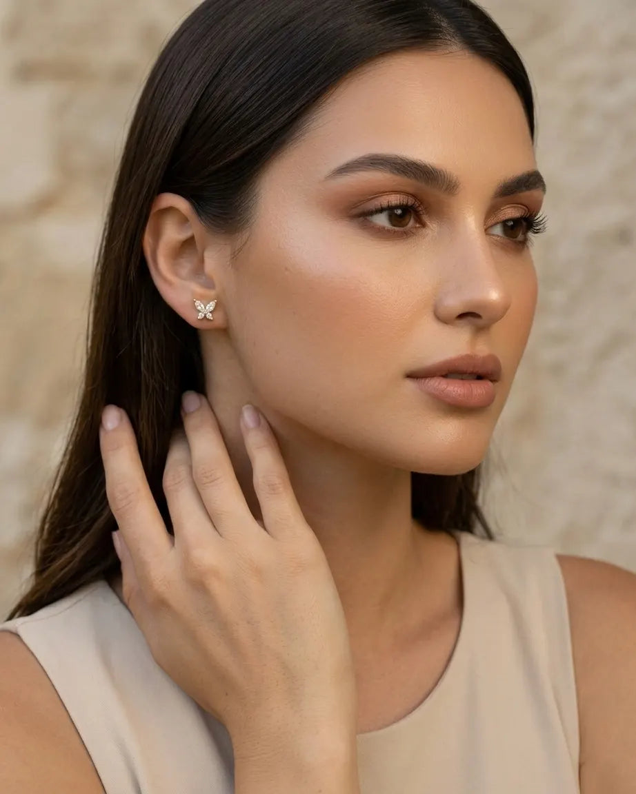 model-wearing-silver-butterfly-stud-earrings-lifestyle, elegant-modern-feminine-jewelry-on-ear, professional-women-luxury-accessories, chic-crystal-animal-studs-styling, luxury-lifestyle-brand-model
