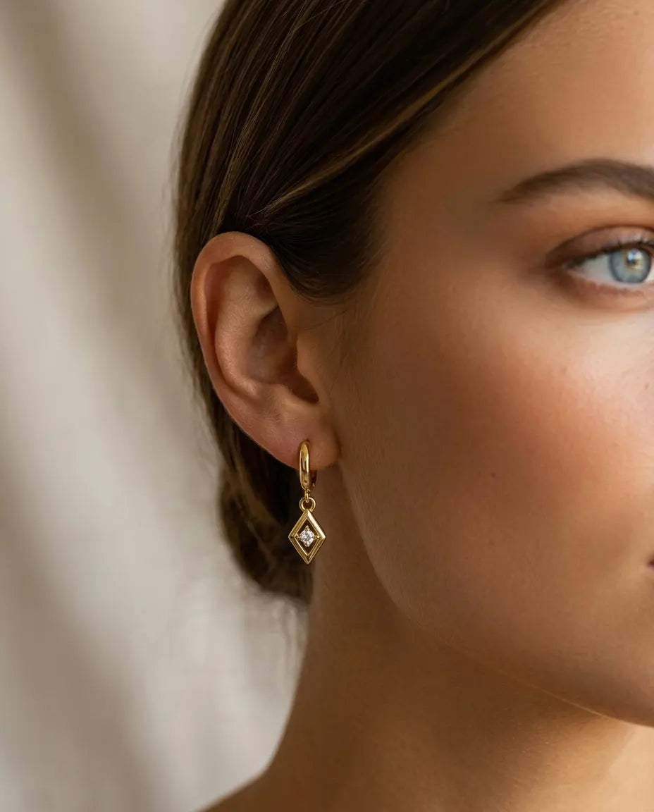 model-wearing-silver-charm-solitaire-drop-earrings-lifestyle, elegant-modern-feminine-jewelry-on-ear, professional-women-luxury-accessories, chic-micro-pave-silver-styling, luxury-lifestyle-brand-model