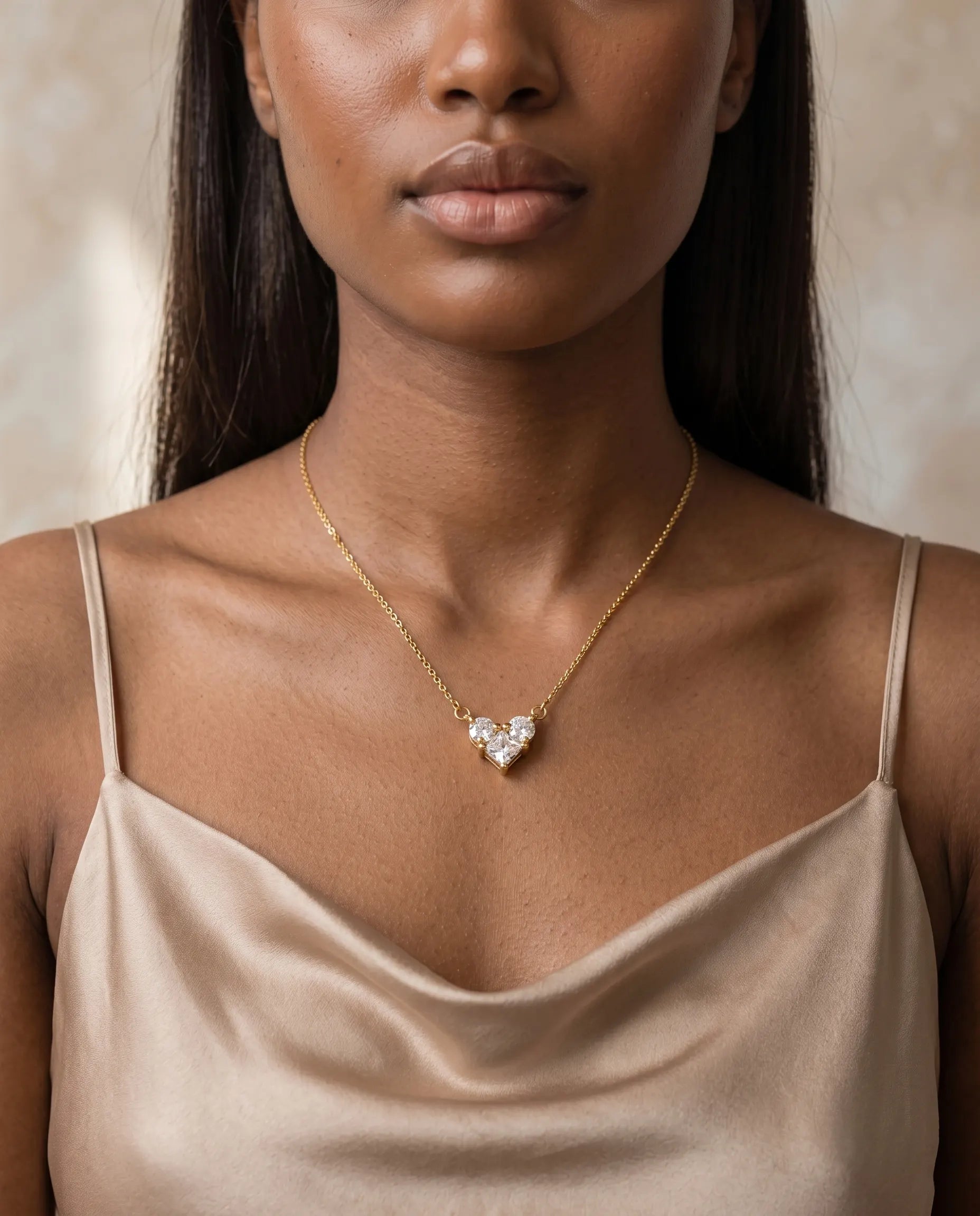 model-wearing-silver-hearted-necklace-lifestyle, elegant-modern-feminine-jewelry-on-neck, professional-women-luxury-accessories, chic-crystal-heart-pendant-styling, luxury-lifestyle-brand-model