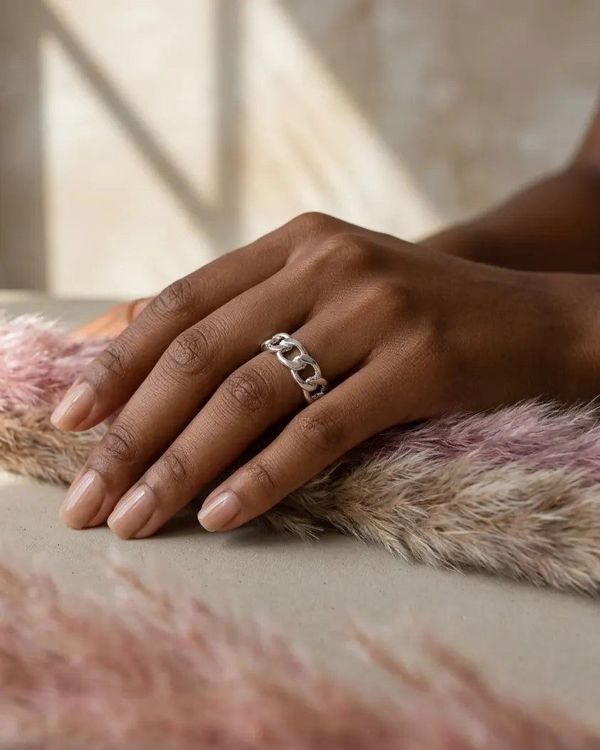 model-wearing-silver-rubia-chain-link-ring-lifestyle, elegant-modern-feminine-jewelry-on-hand, professional-women-luxury-accessories, chic-bold-silver-ring-styling, luxury-lifestyle-brand-model