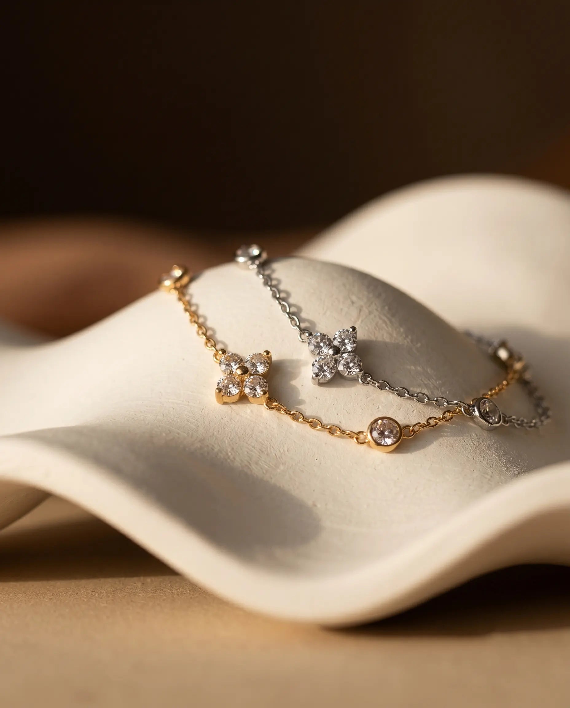 model-wearing-the-chloe-flower-bracelet-showcasing-delicate-floral-charms-and-comfortable-wrist-fit-minimalist-styling
