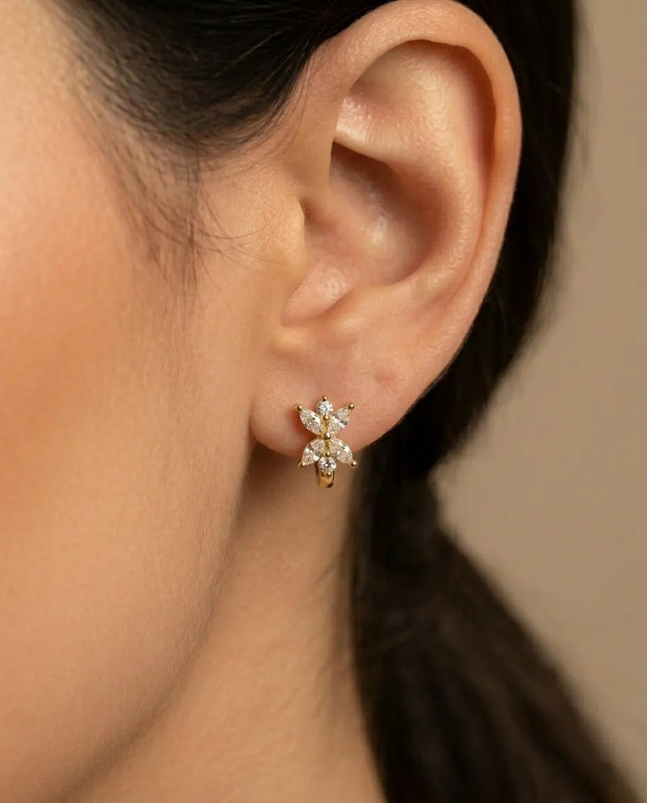 model-wearing-the-mirabel-butterfly-huggie-hoops-showcasing-sophisticated-minimalist-ear-stacking