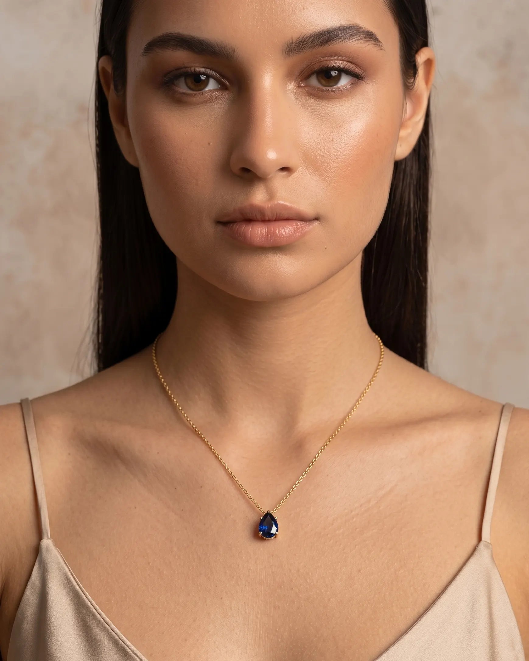 model-wearing-violet-birthstone-necklace-gold, elegant-teardrop-pendant-lifestyle, professional-women-jewelry-style, chic-minimalist-accessories-for-daily-wear, luxury-lifestyle-brand-photography, premium-jewelry-model-shot