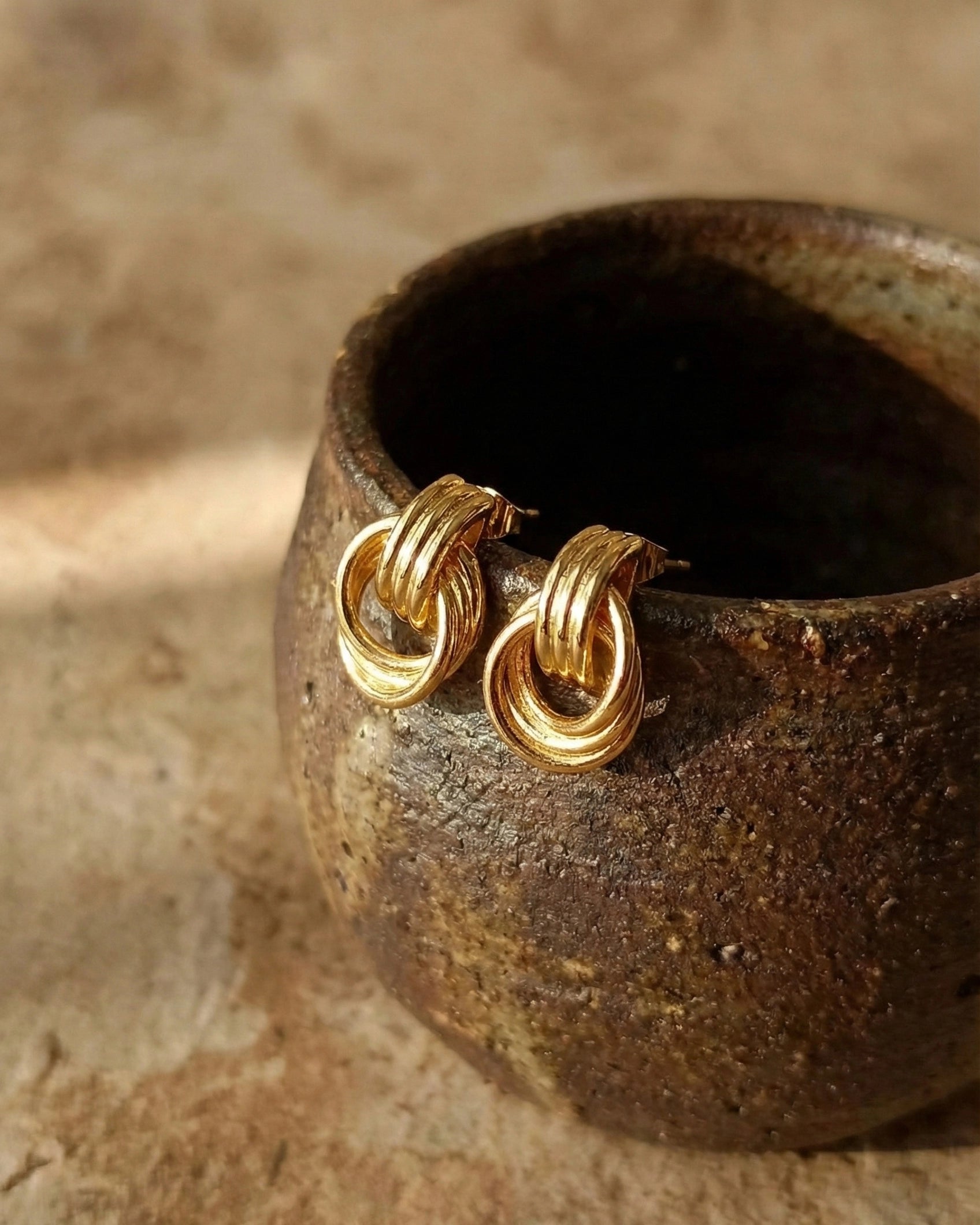 monaco-double-hoop-earrings-gold-pvd-stainless-steel, intertwined-bold-gold-hoops-luxury, luxury-waterproof-jewelry-aesthetic, 316L-stainless-steel-earrings-europe, senya-jewelry-best-seller-monaco-hoops