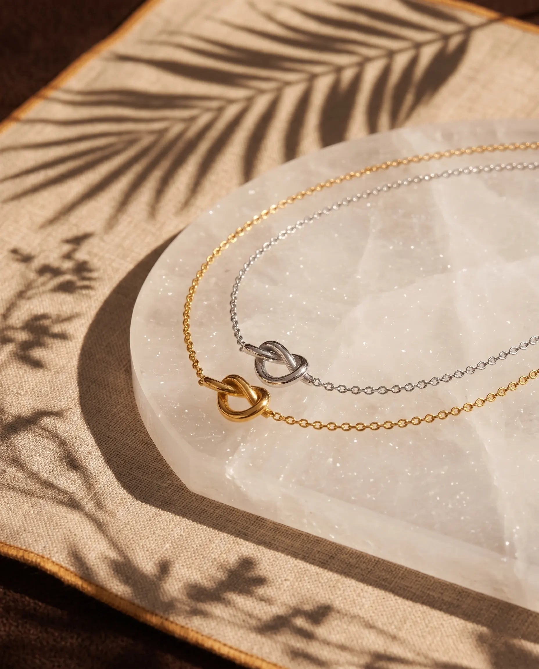 nerissa-knot-pendant-necklace-in-waterproof-stainless-steel-minimalist-gold-and-silver-jewelry-design-by-senya
