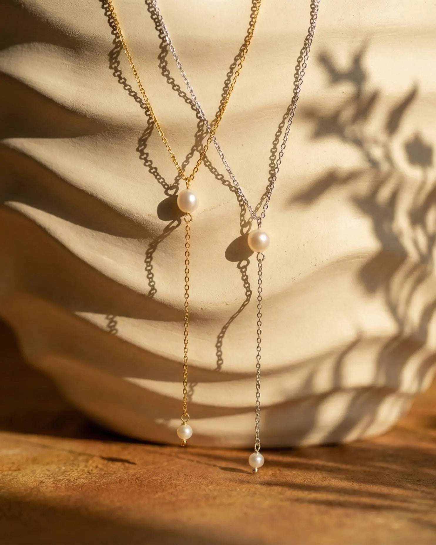 pacifica-lariat-pearl-necklace-gold-silver-pvd-steel, elegant-long-pearl-drop-necklace, luxury-waterproof-jewelry-aesthetic, 316L-stainless-steel-necklace-europe, senya-jewelry-best-seller-lariat