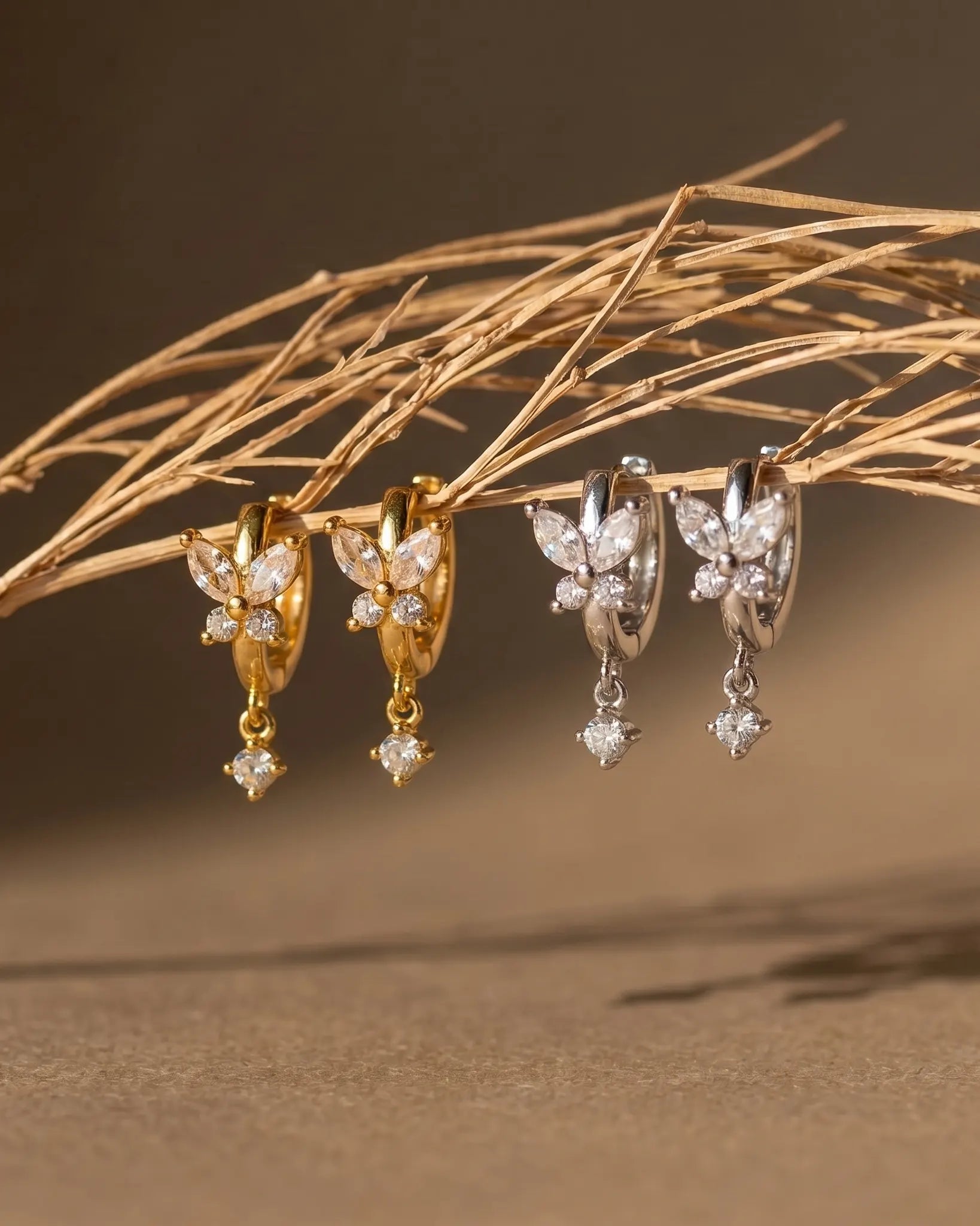 premium-quality-butterfly-zirconia-earrings, durable-gold-plating-detail-europe, anniversary-gift-gold-butterfly-drops, refined-minimalist-jewelry-aesthetic, sustainable-silver-jewelry-brand-europe