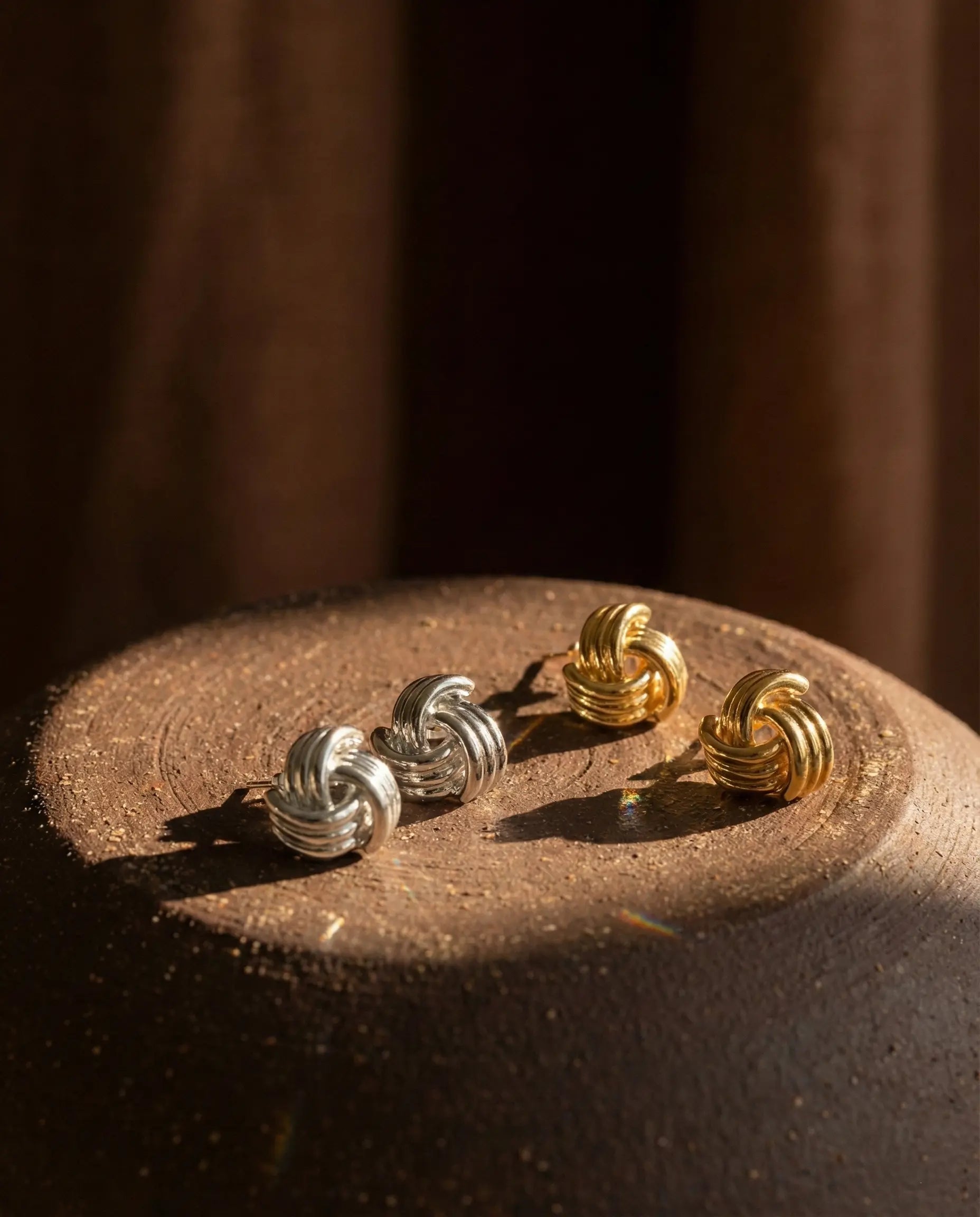 premium-quality-samira-gold-knot-earrings, durable-gold-plating-detail-europe, anniversary-gift-gold-sculptural-studs, refined-minimalist-eternity-aesthetic, sustainable-steel-jewelry-brand-europe