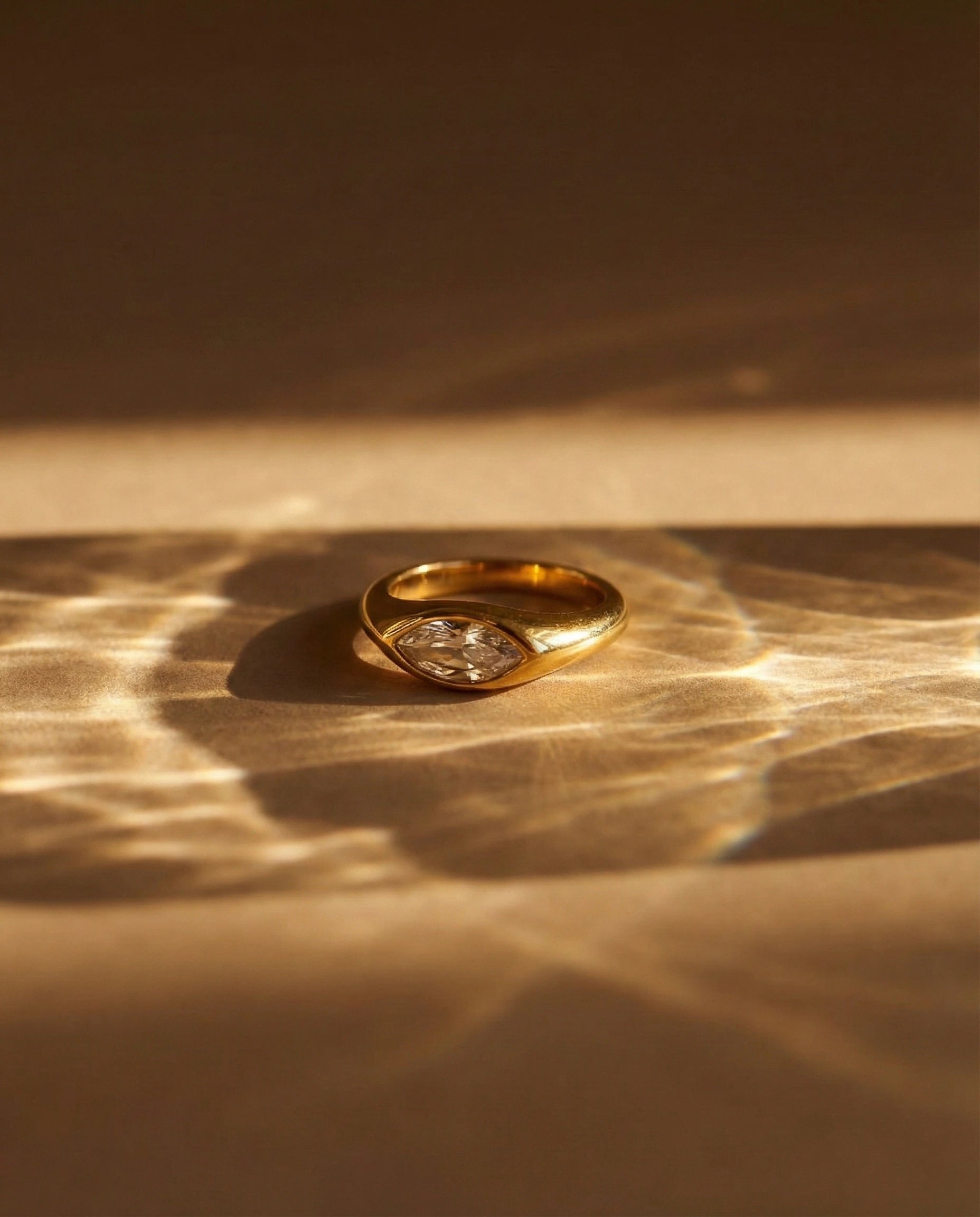 premium-quality-selah-marquise-zirconia-ring, durable-gold-plating-detail-europe, anniversary-gift-gold-statement-ring, refined-minimalist-bold-aesthetic, sustainable-steel-jewelry-brand-europe