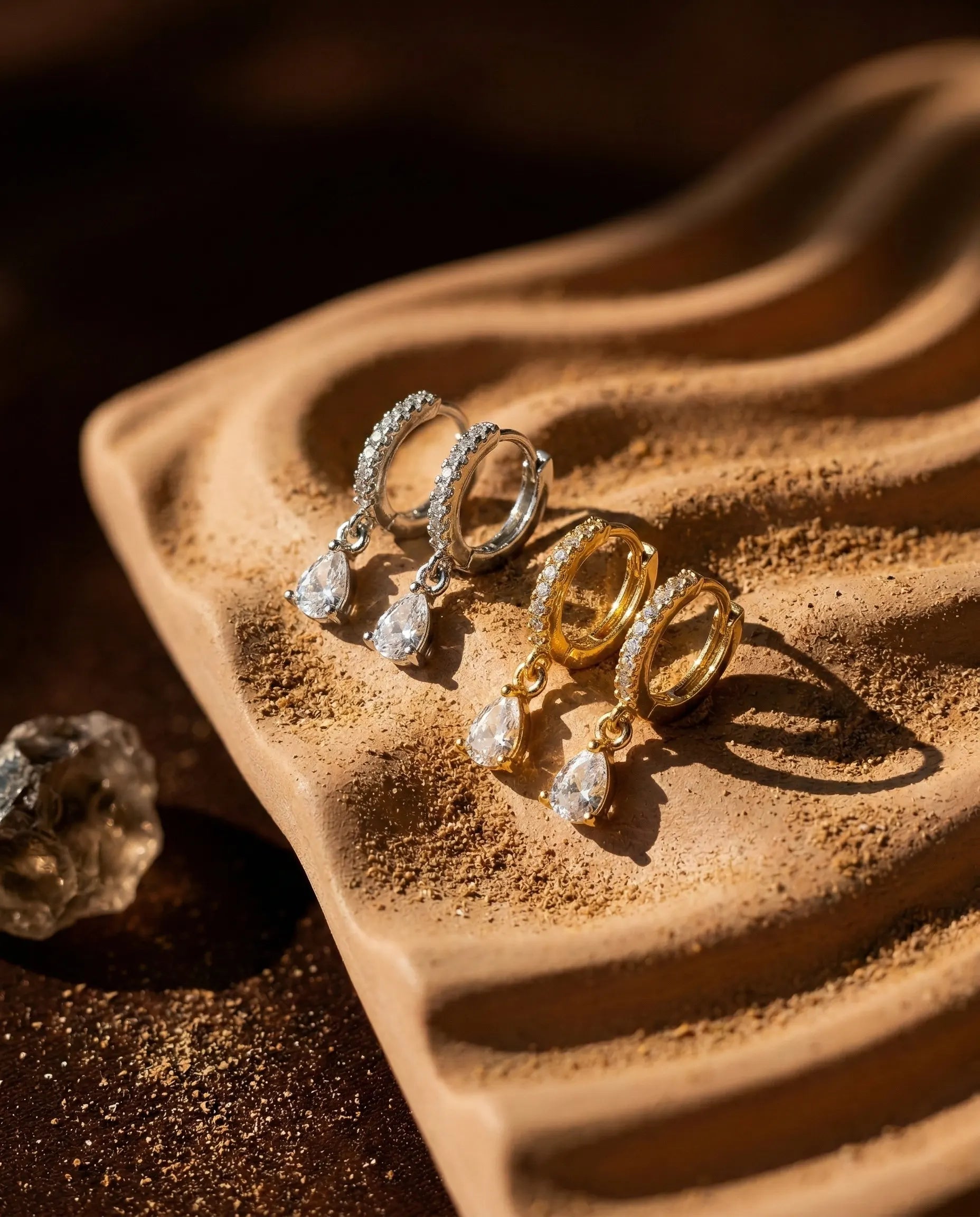 quiola-teardrop-crystal-huggie-earrings-silver-gold-925, elegant-shimmering-teardrop-pendant-luxury, high-quality-cubic-zirconia-jewelry-aesthetic, senya-jewelry-best-seller-quiola