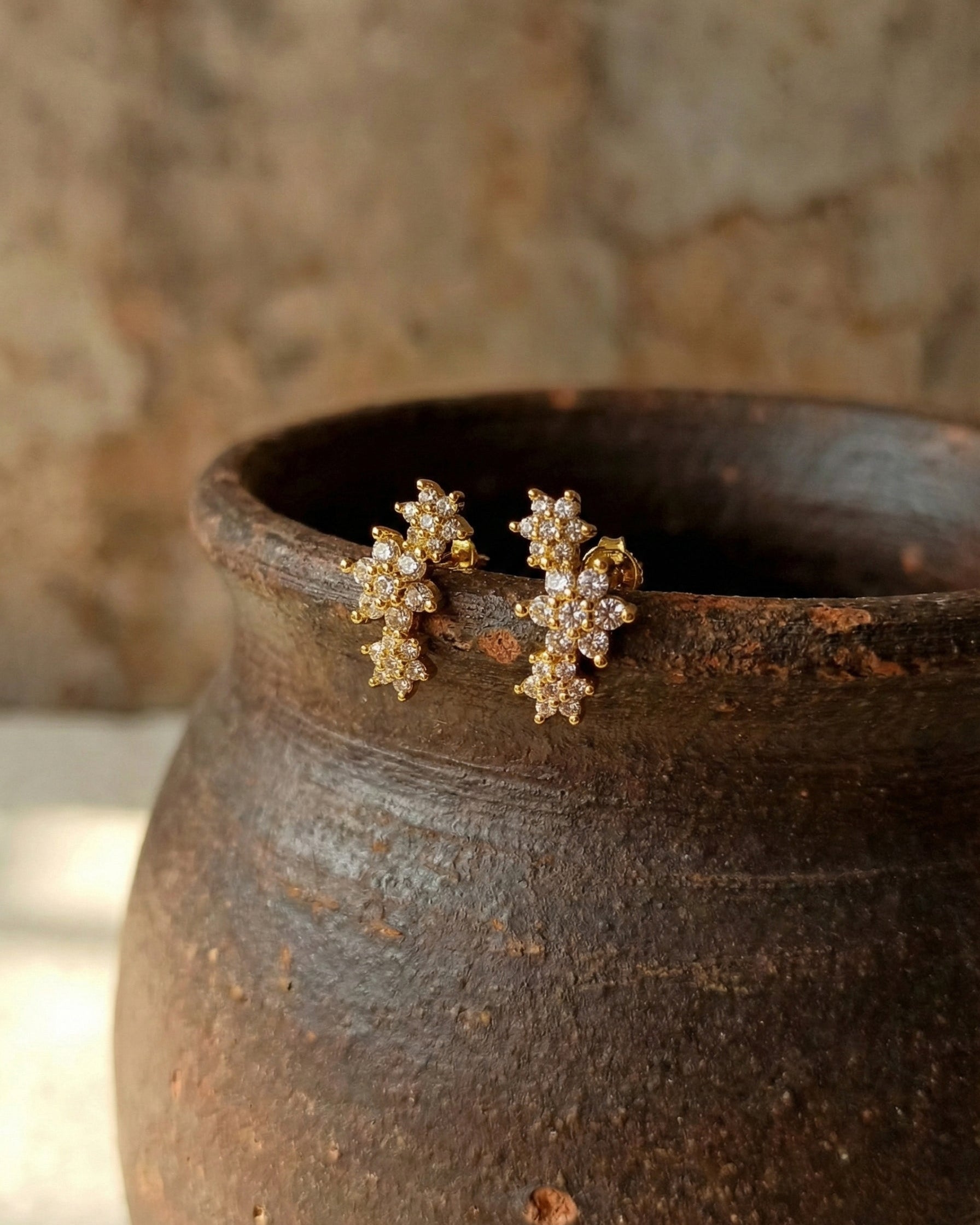 silver-jewelry-brand, unique-floral-design-studs, minimalist-jewelry-unboxing-aesthetic, high-end-fashion-floral-earrings, versatile-jewelry-for-special-occasions, waterproof-sparkle-flower-studs