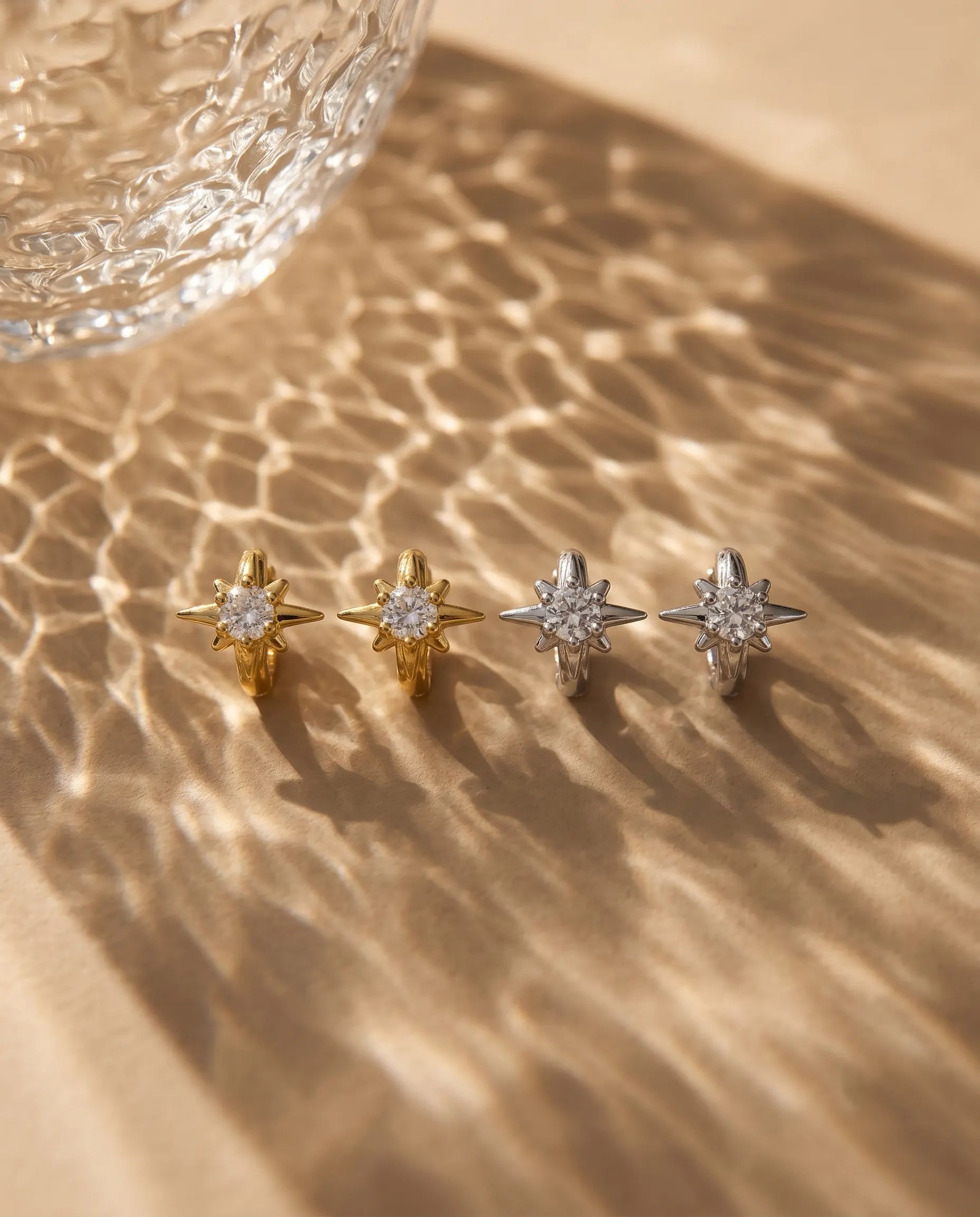 star-huggie-hoops-captured-in-warm-natural-light-to-emphasize-the-celestial-minimalist-aesthetic